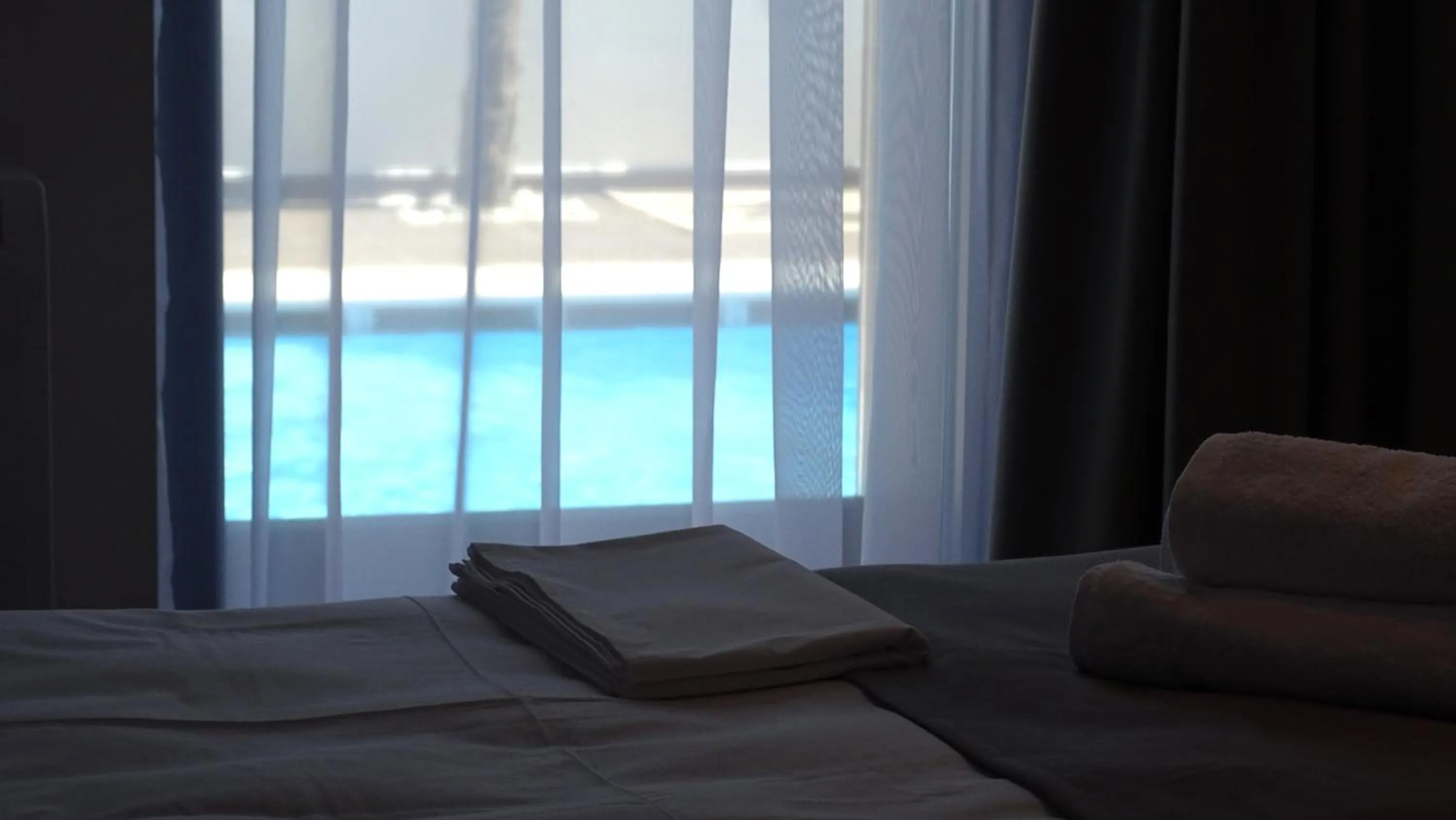 Bed in Valmar Hotel