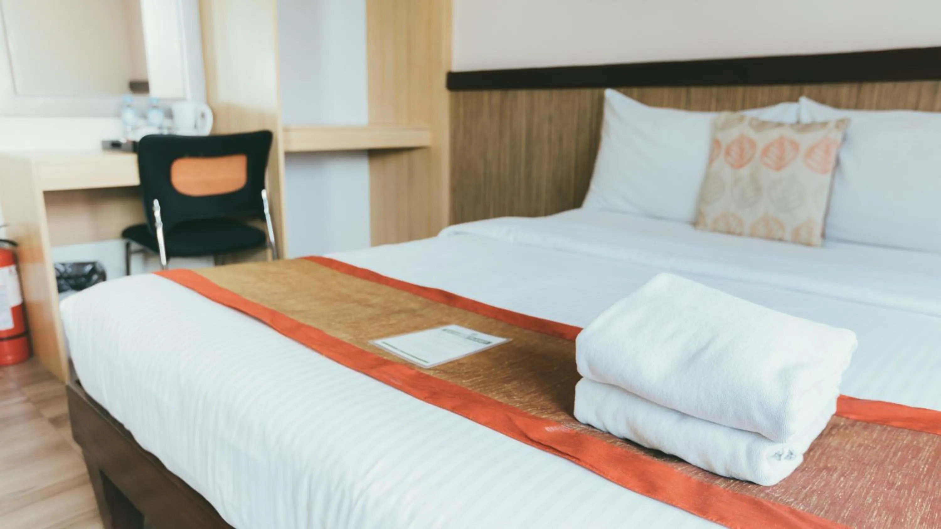 Bed in NS Royal Hotel