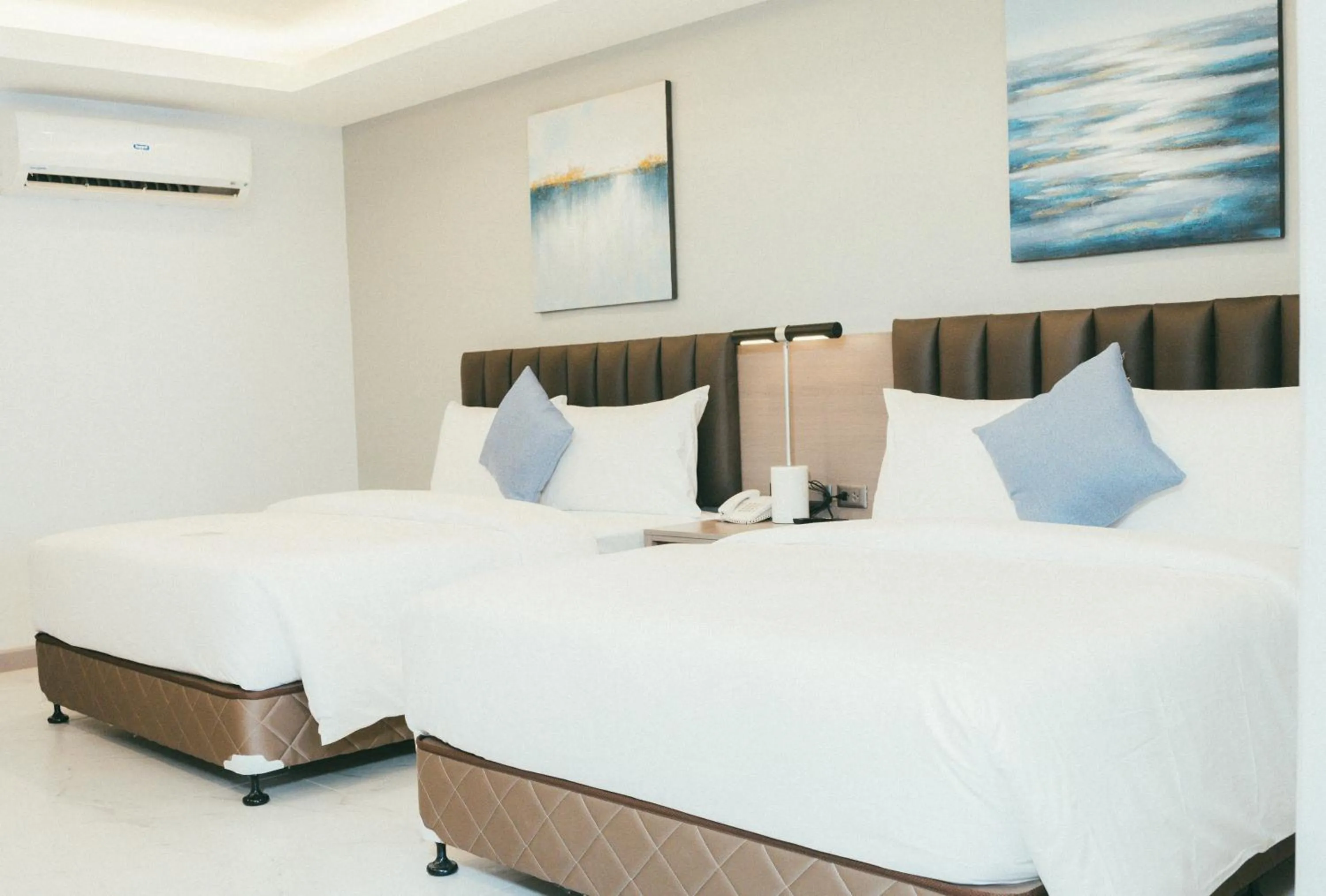 Bed in NS Royal Hotel