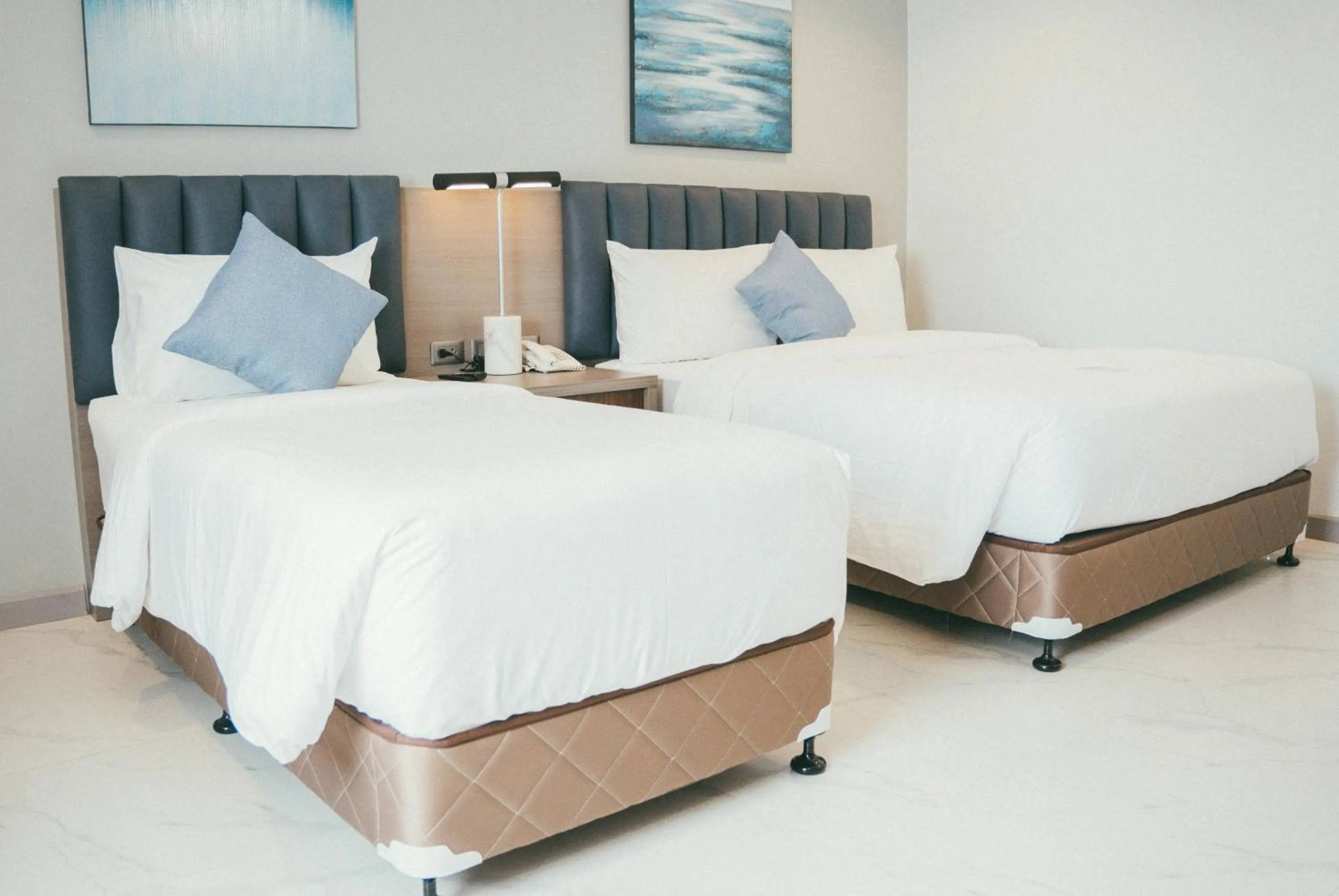 Bed in NS Royal Hotel