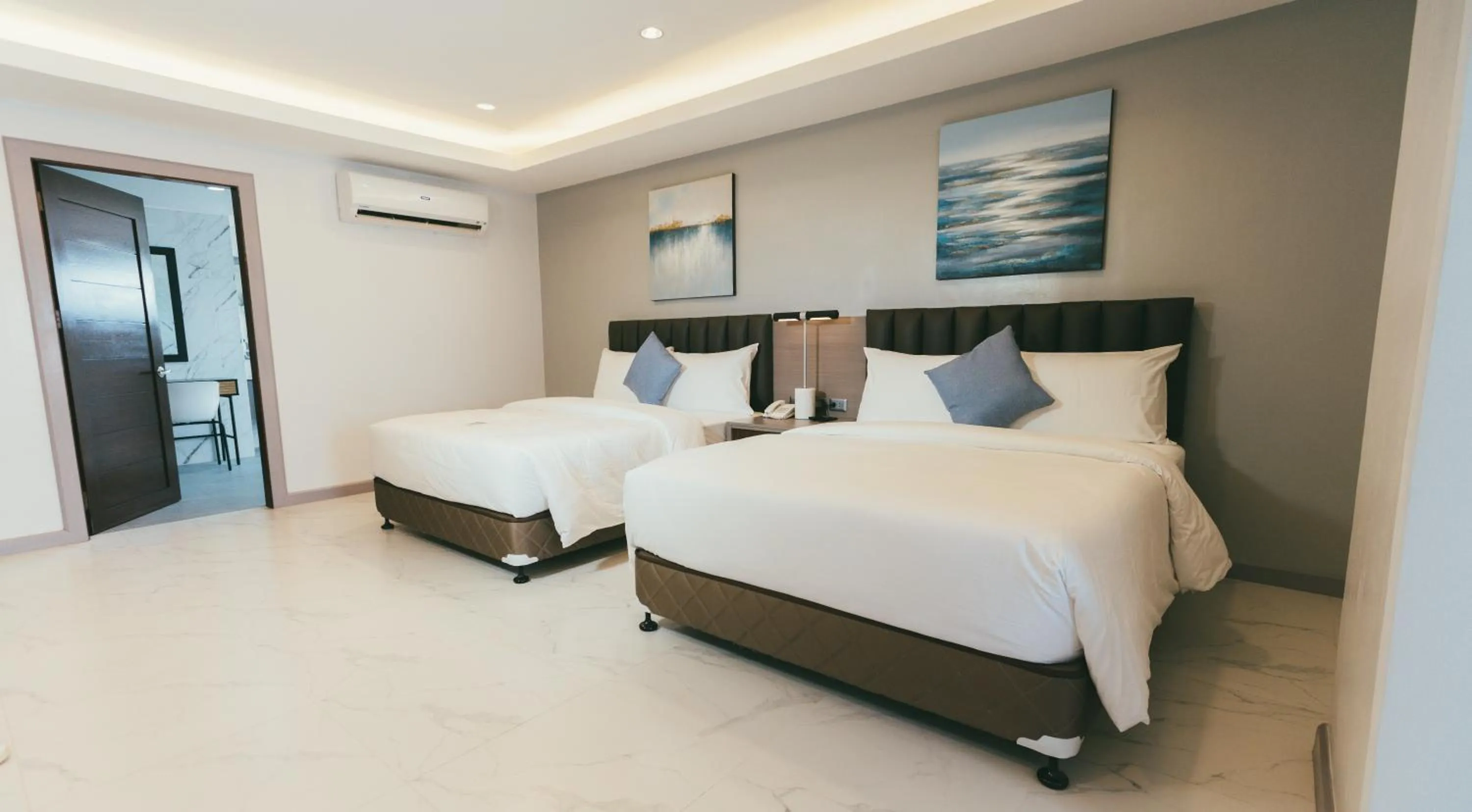 Bed in NS Royal Hotel