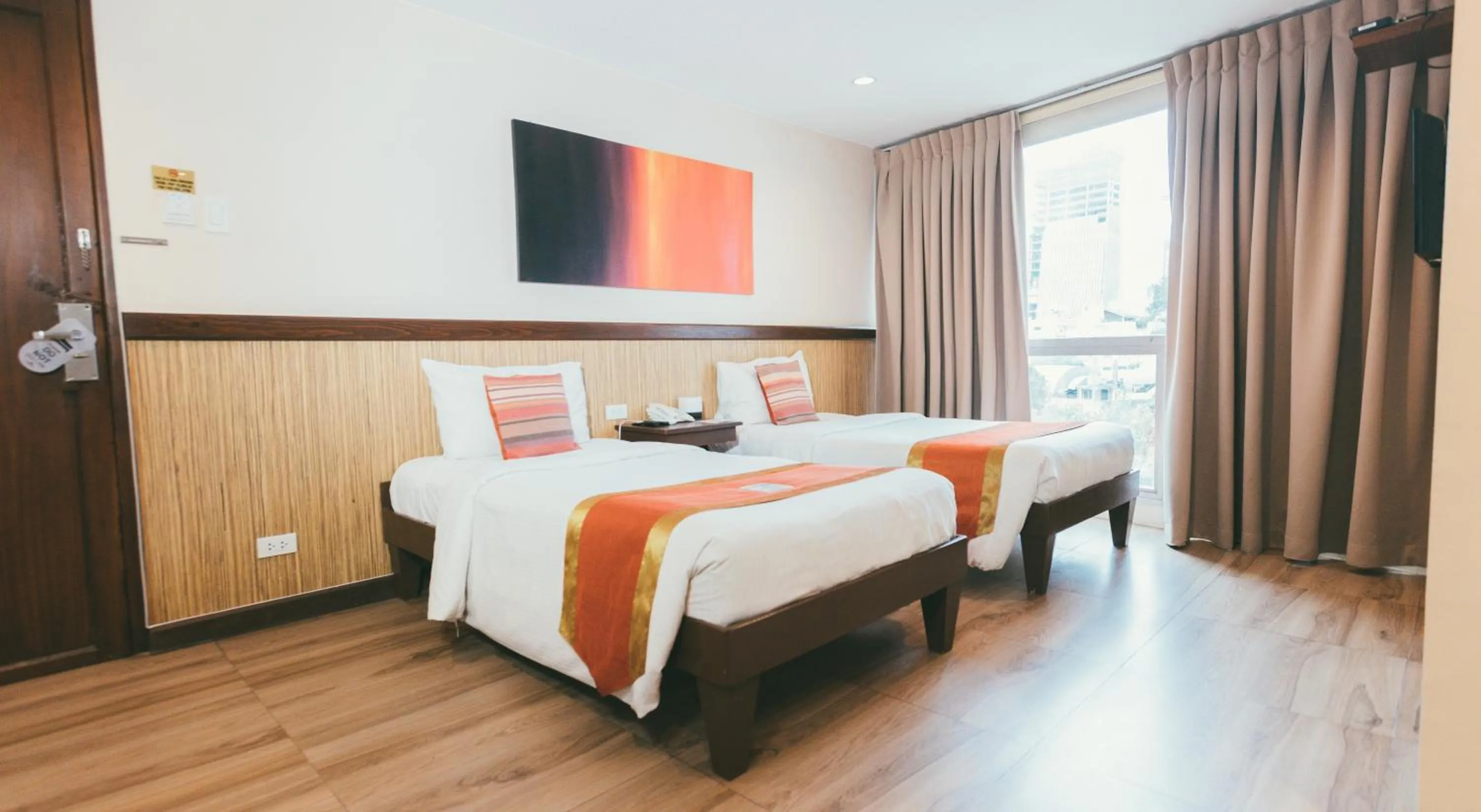 Bed in NS Royal Hotel