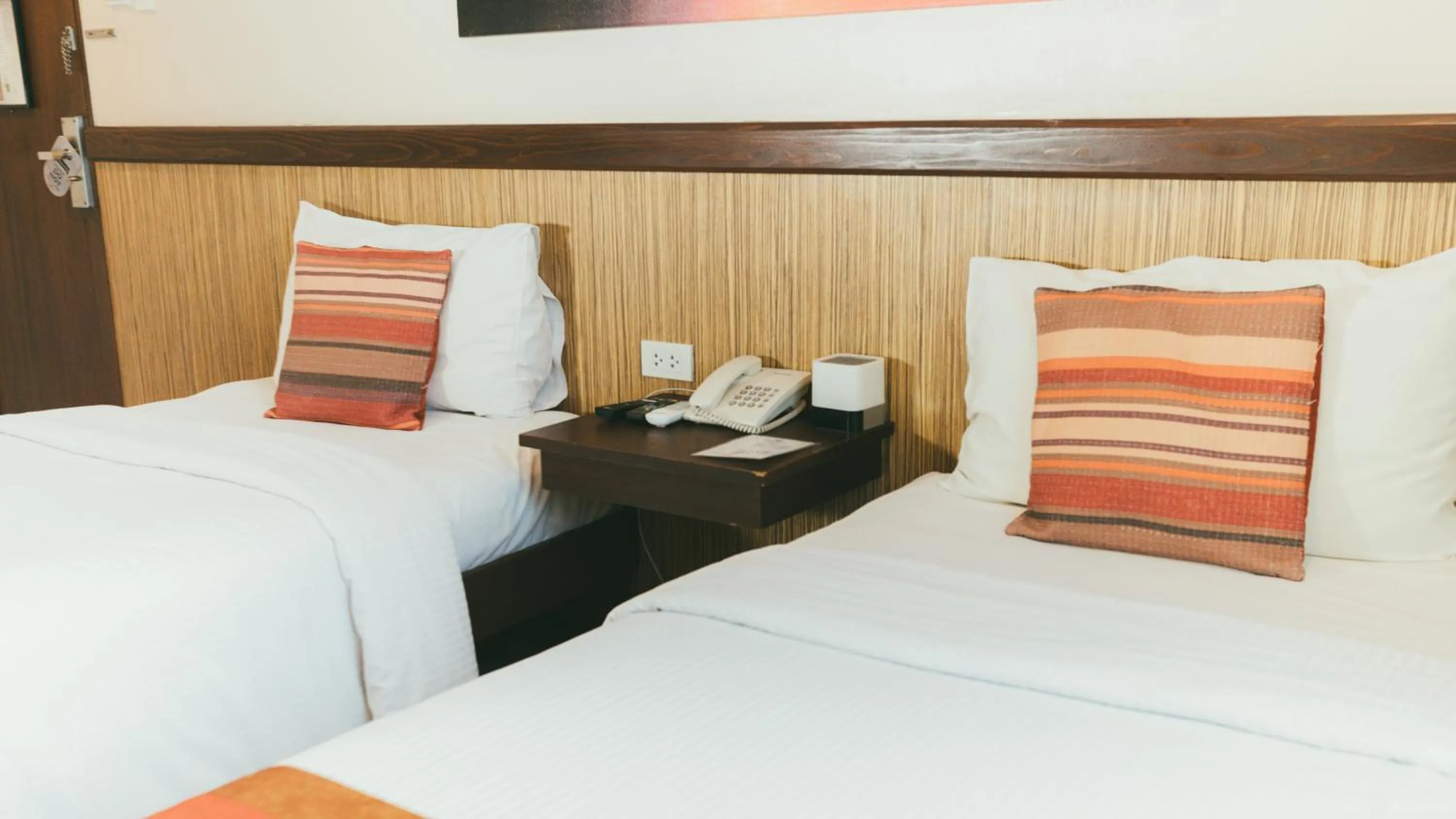 Bed in NS Royal Hotel