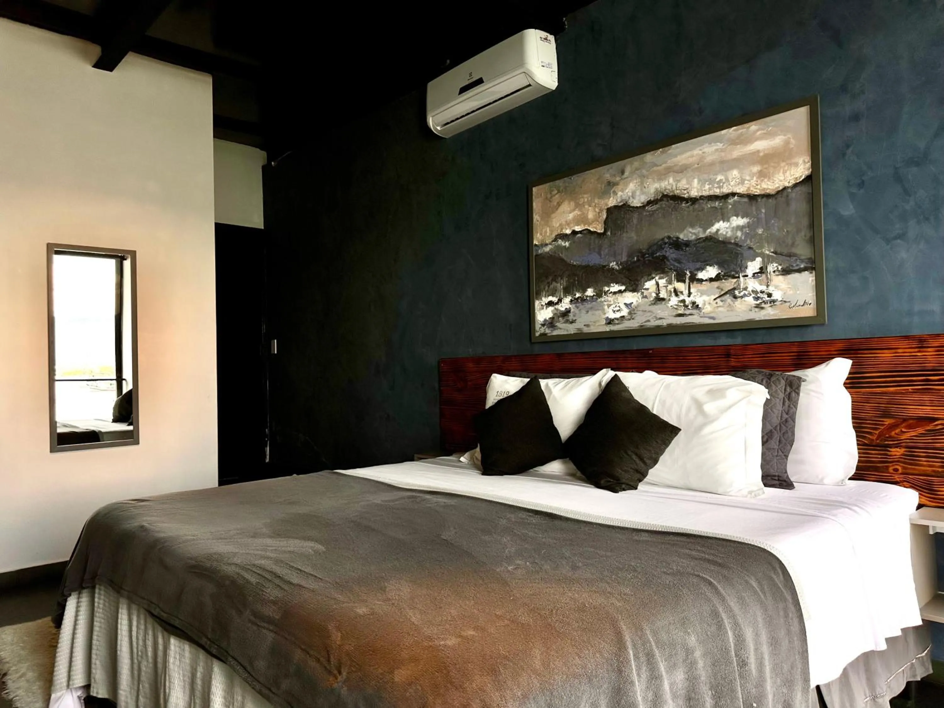 Bed in 1819 Marine Hotel