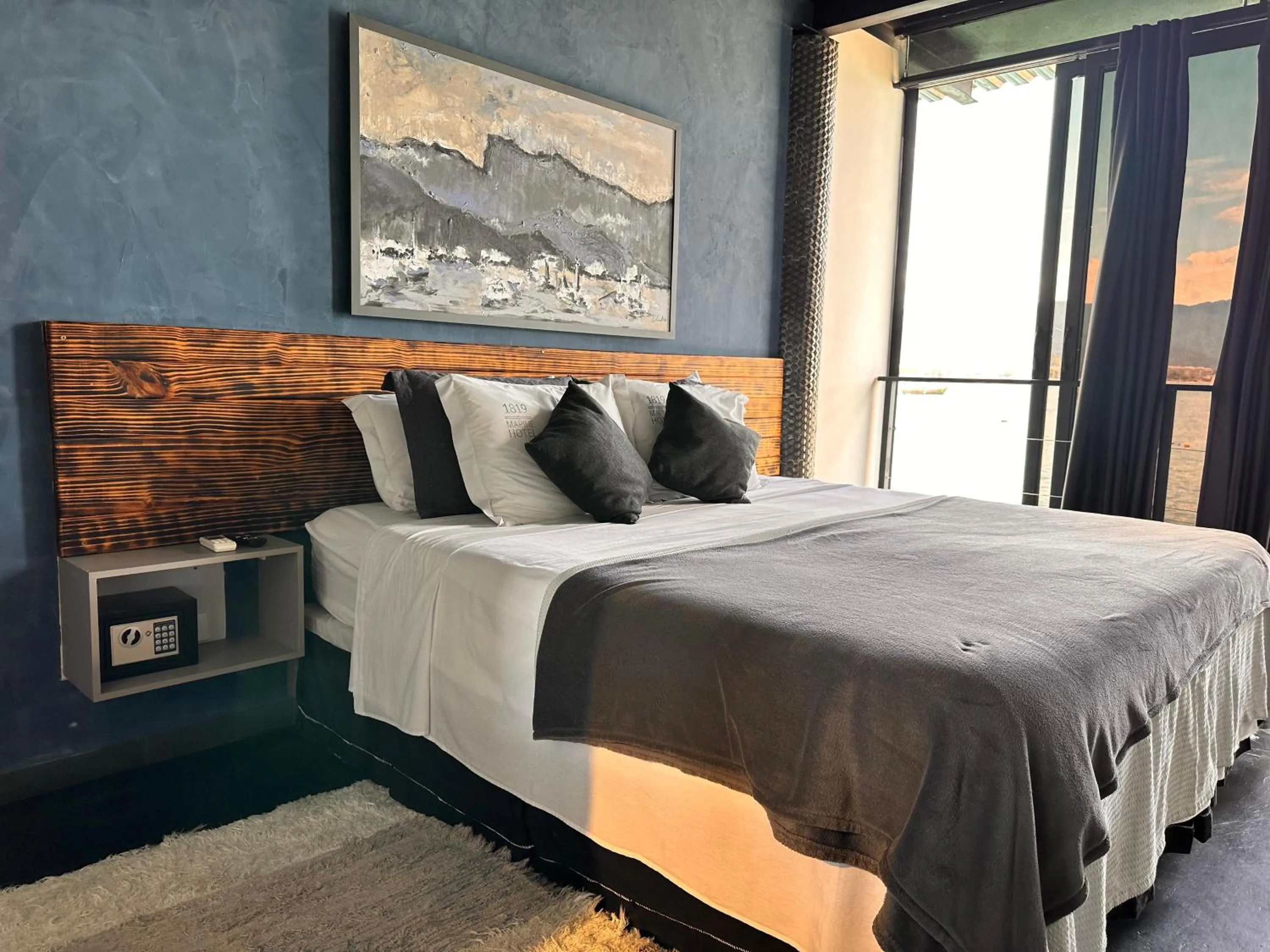 Bed in 1819 Marine Hotel