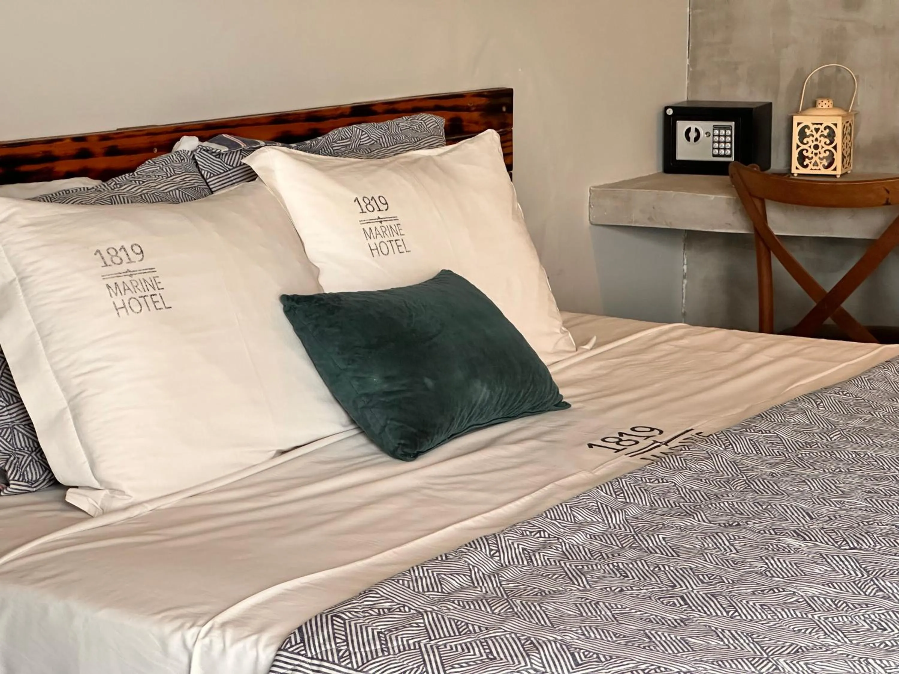 Bed in 1819 Marine Hotel