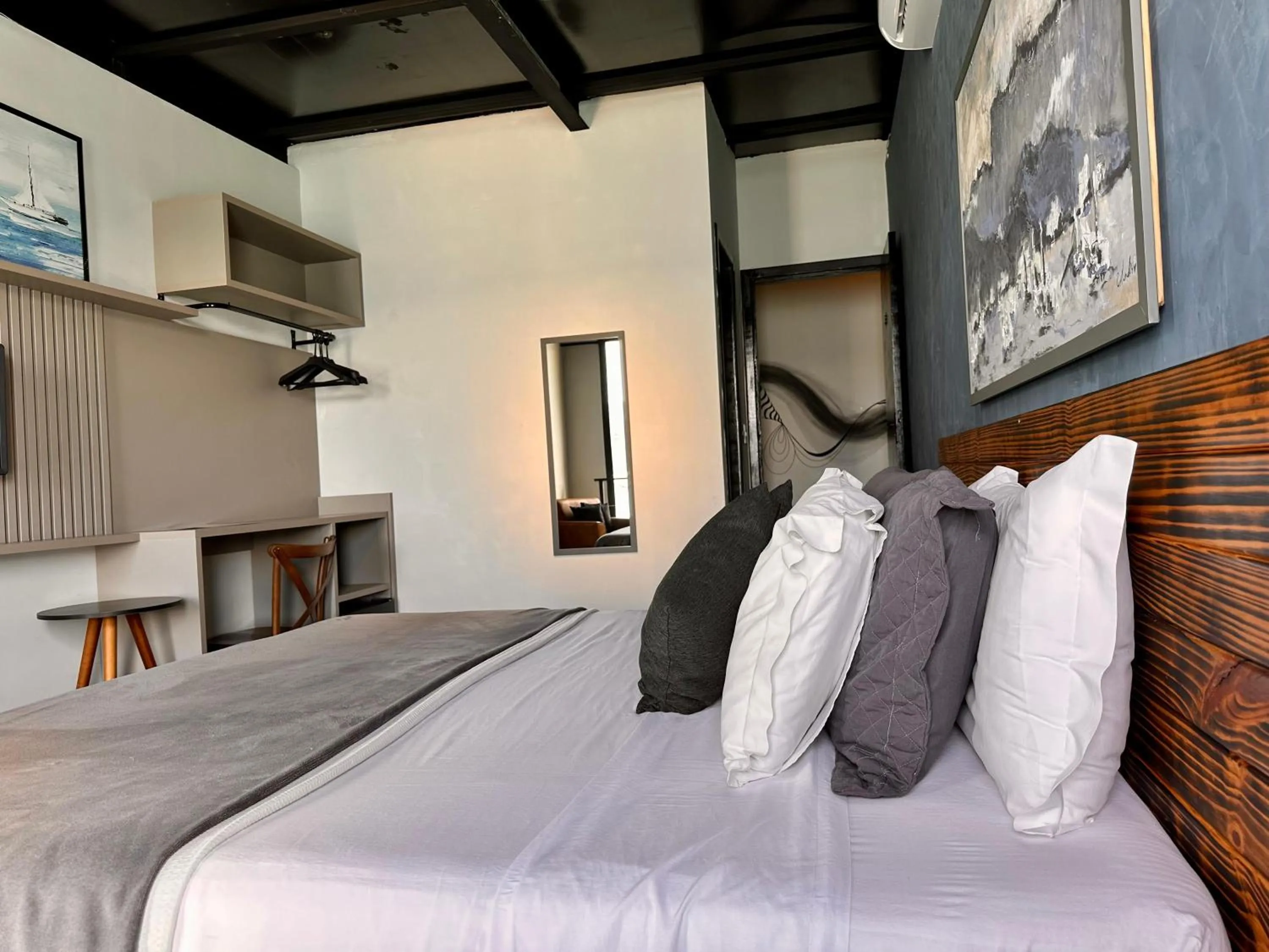 Bed in 1819 Marine Hotel