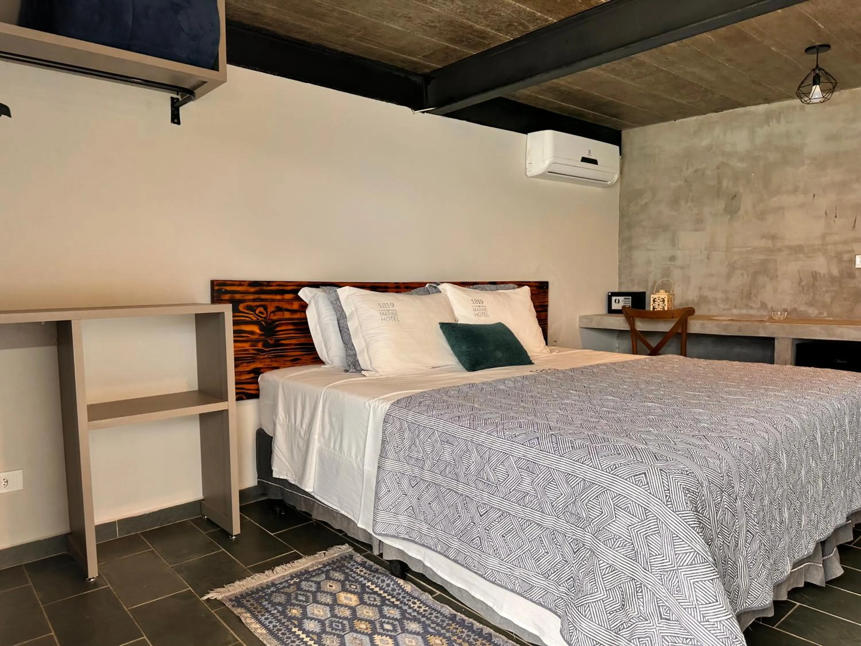 Bed in 1819 Marine Hotel