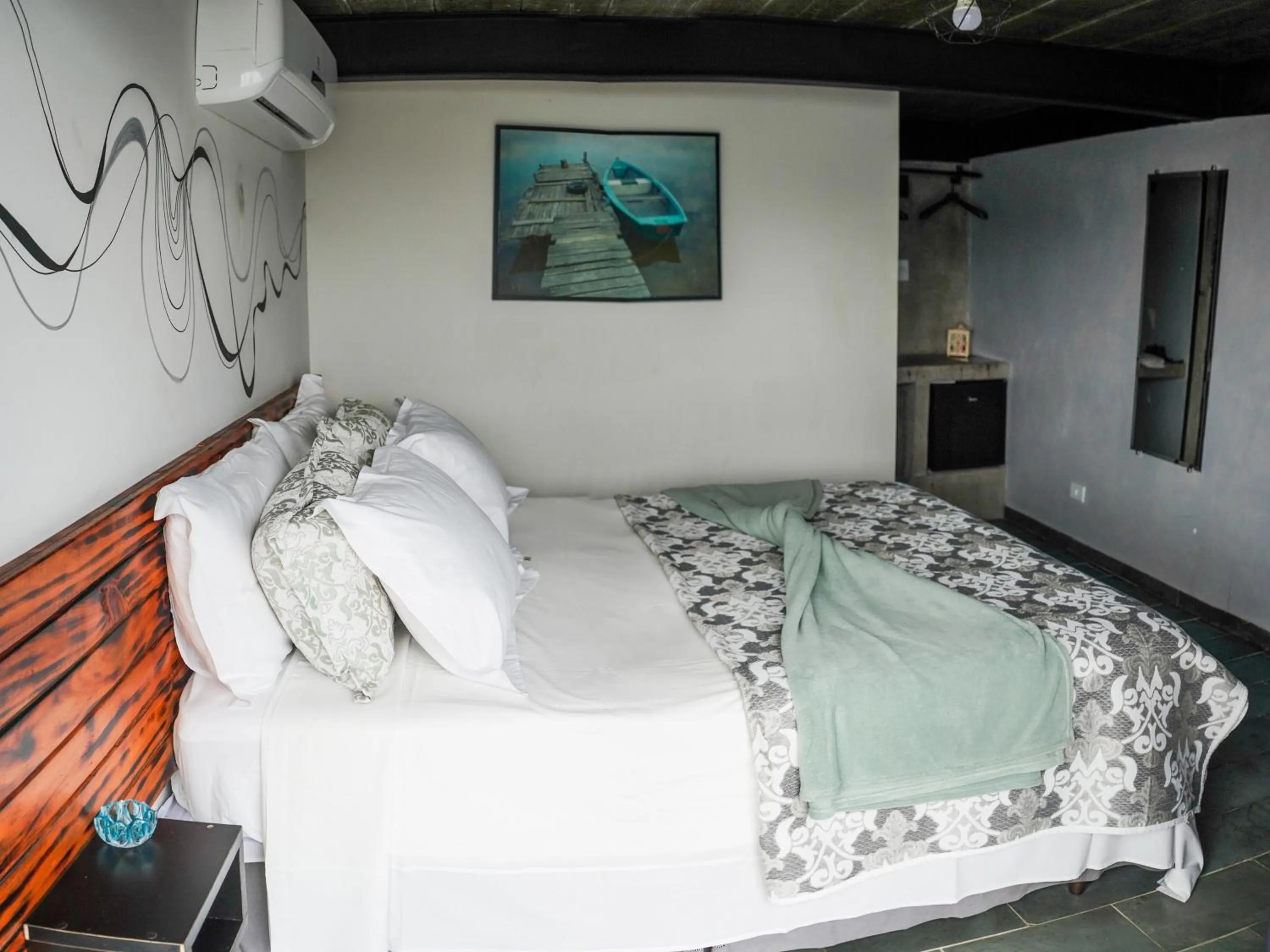 Bed in 1819 Marine Hotel