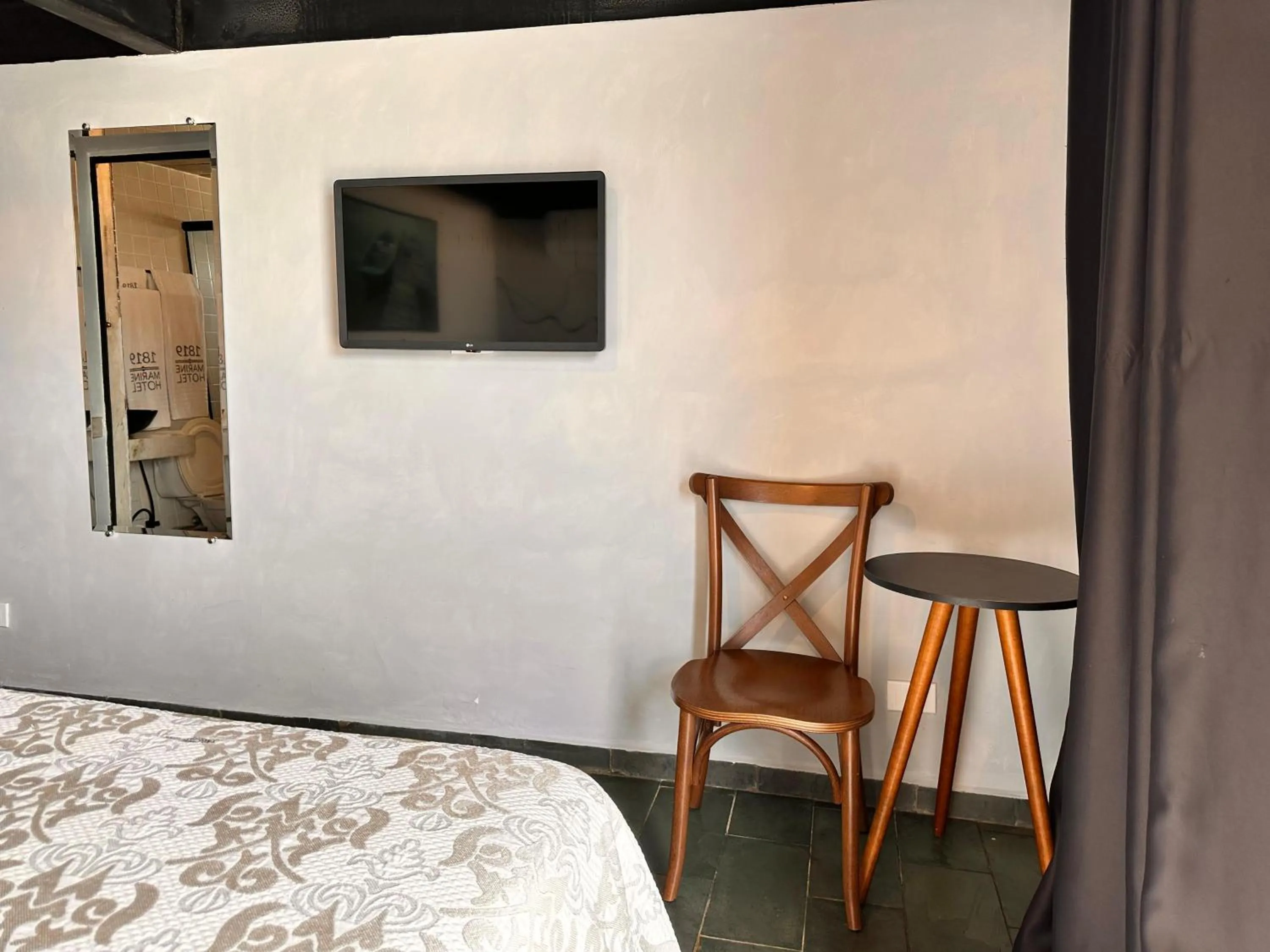 Bed in 1819 Marine Hotel