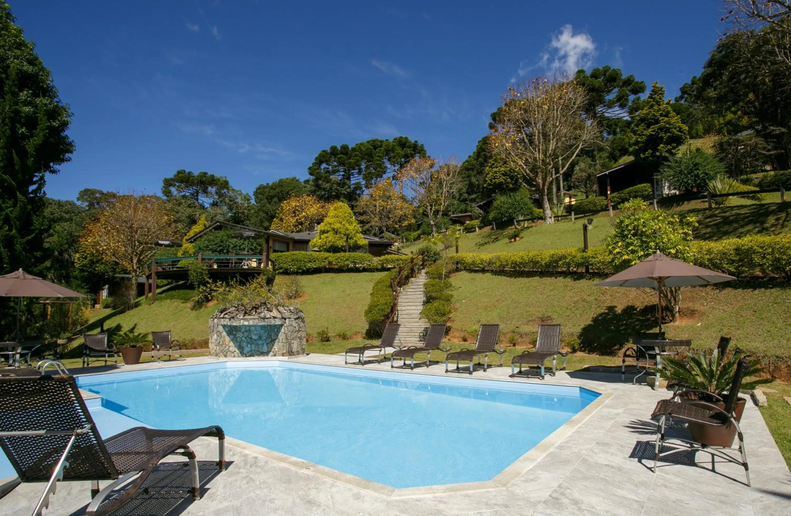 Pool view in Pousada Varanda das Colinas