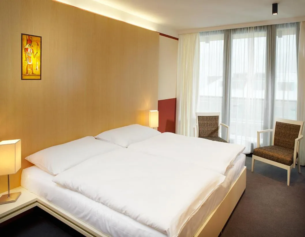 Bed in Alexandria Spa & Wellness Hotel