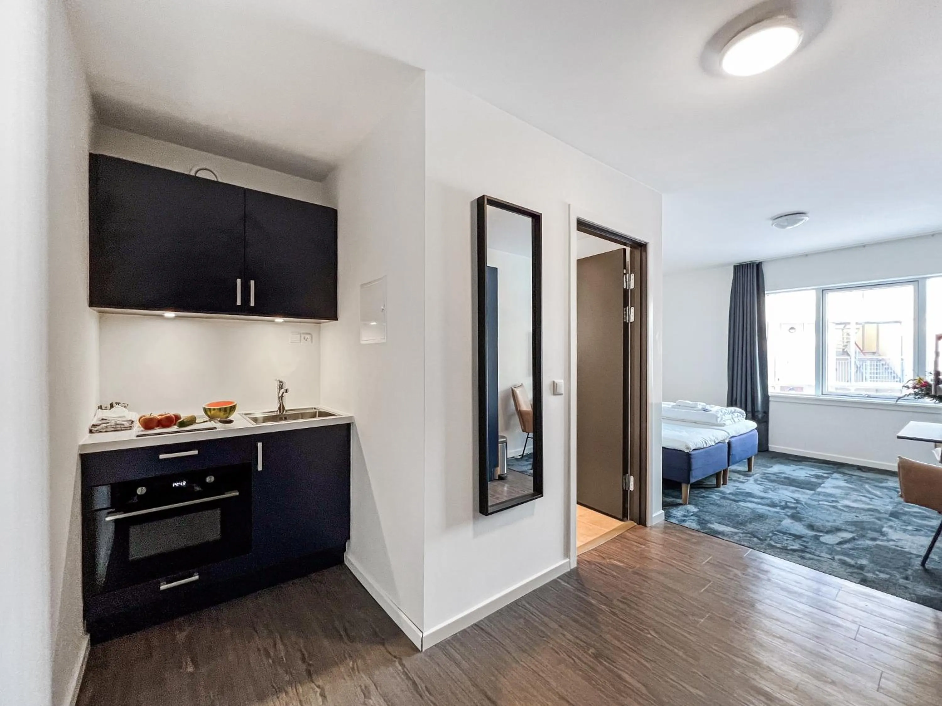 Kitchen or kitchenette, Bed in Hotel Nordbo