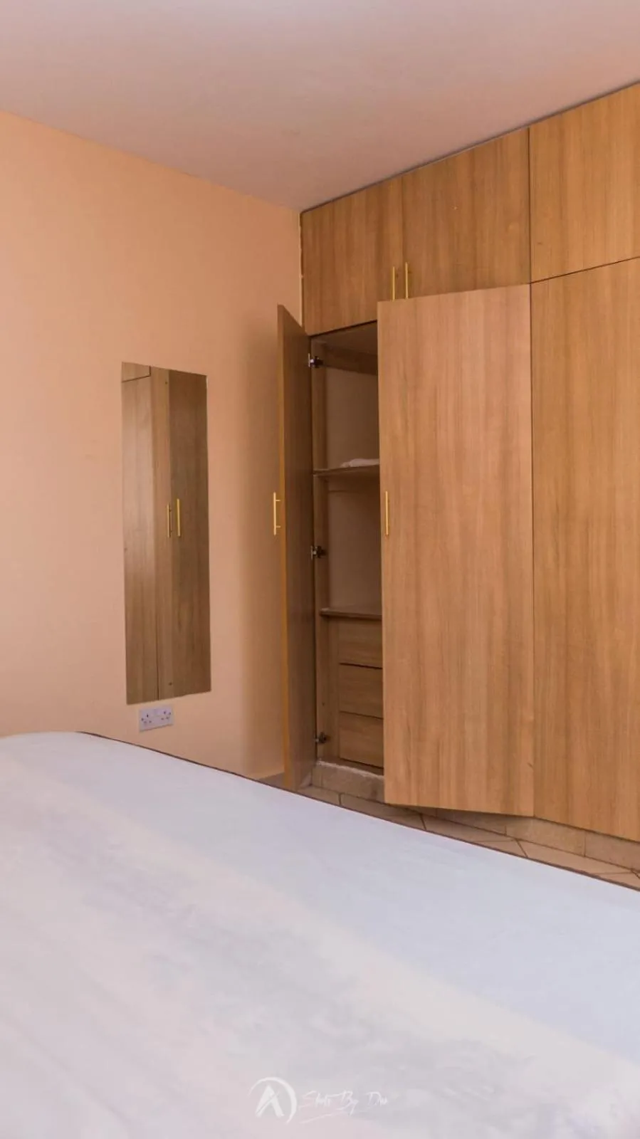 Bed in Lux Suites Makao Rossyln Apartments