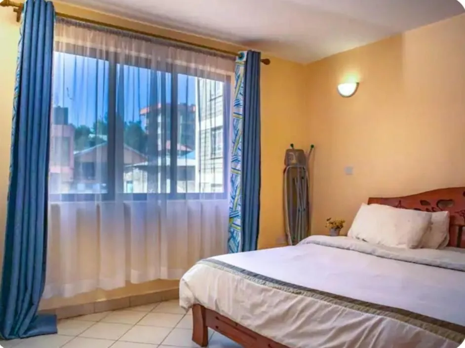 Bed in Lux Suites Makao Rossyln Apartments