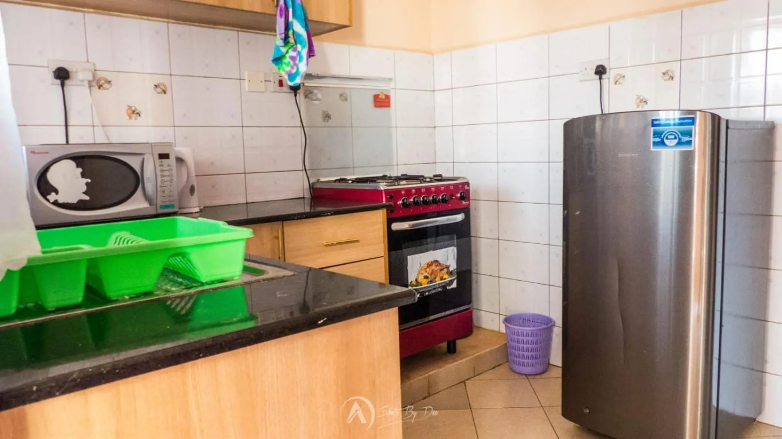 Kitchen or kitchenette in Lux Suites Makao Rossyln Apartments