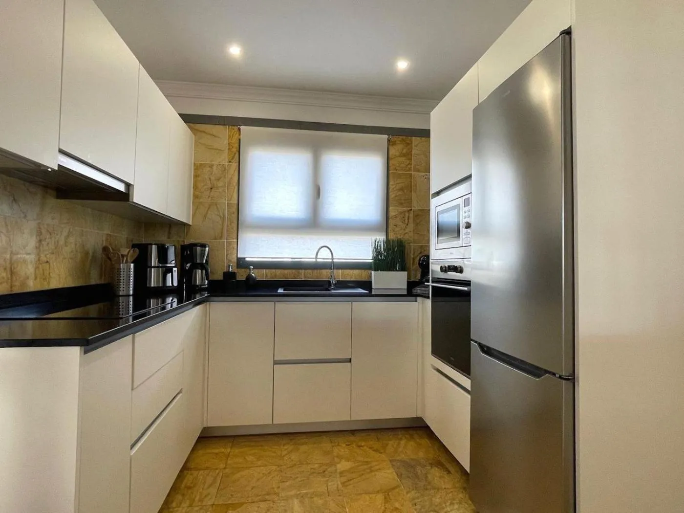 Kitchen or kitchenette in Villa Casa Karoline with a sunny terrace, heated pool, comfort and privacy in a quiet neighborhood
