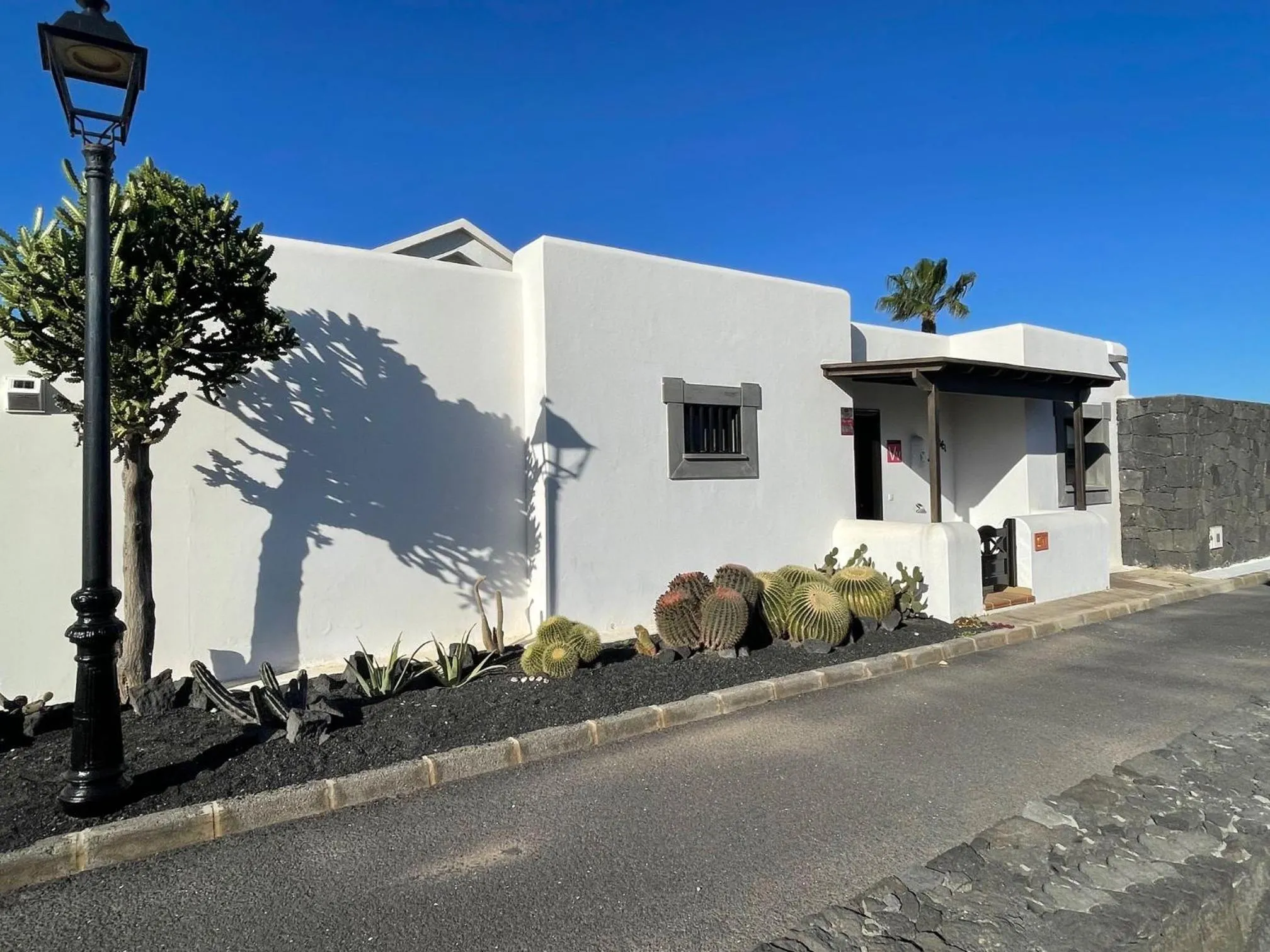 Street view in Villa Casa Karoline with a sunny terrace, heated pool, comfort and privacy in a quiet neighborhood