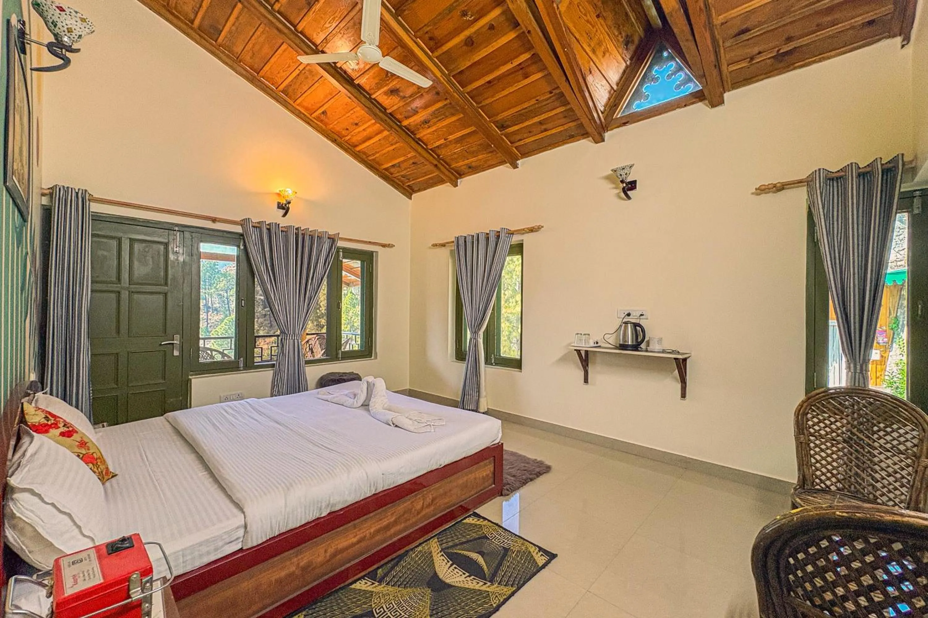 Photo of the whole room, Bed in THEHIMALAYANLIVING WHISTLING PINES