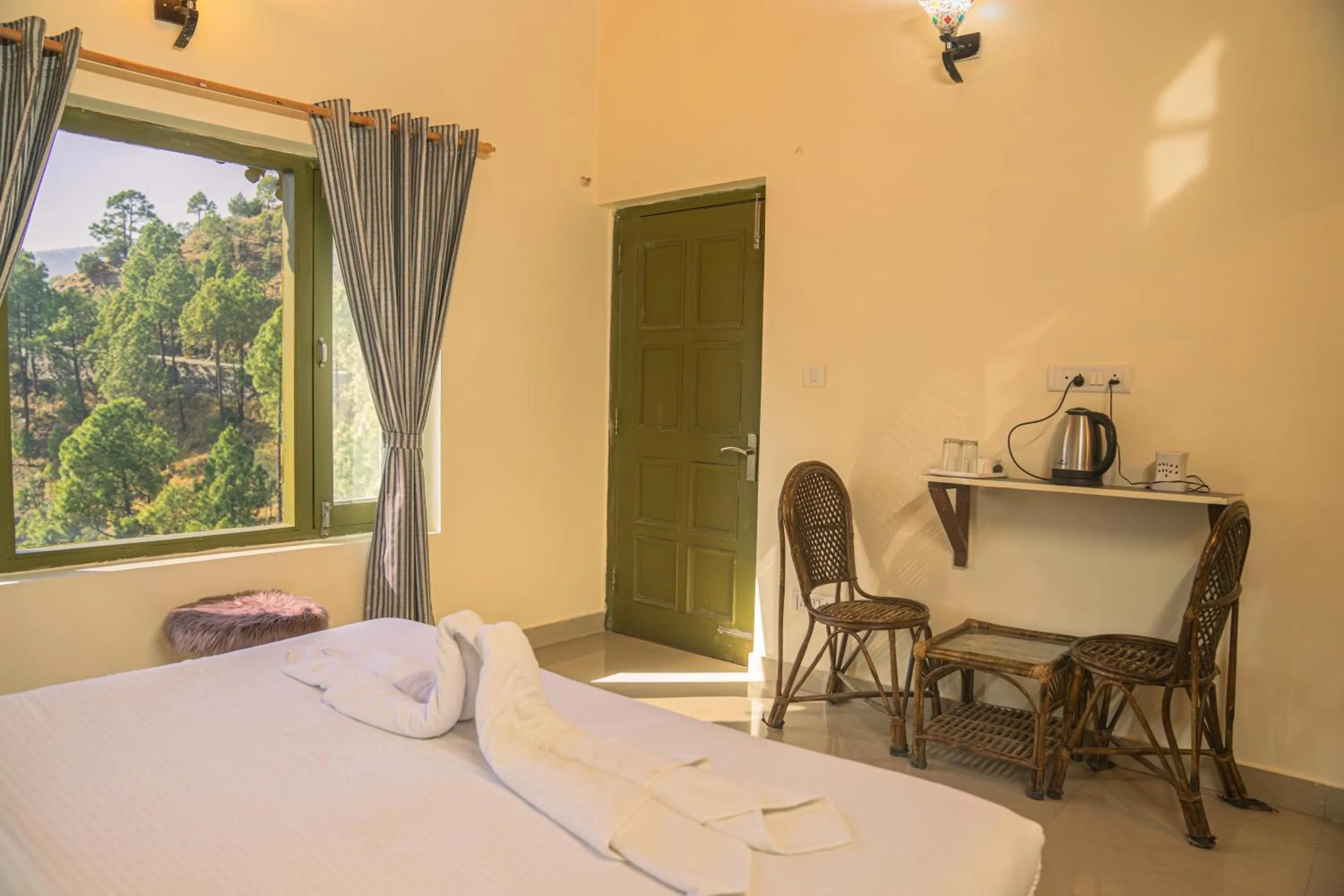 Photo of the whole room, Bed in THEHIMALAYANLIVING WHISTLING PINES