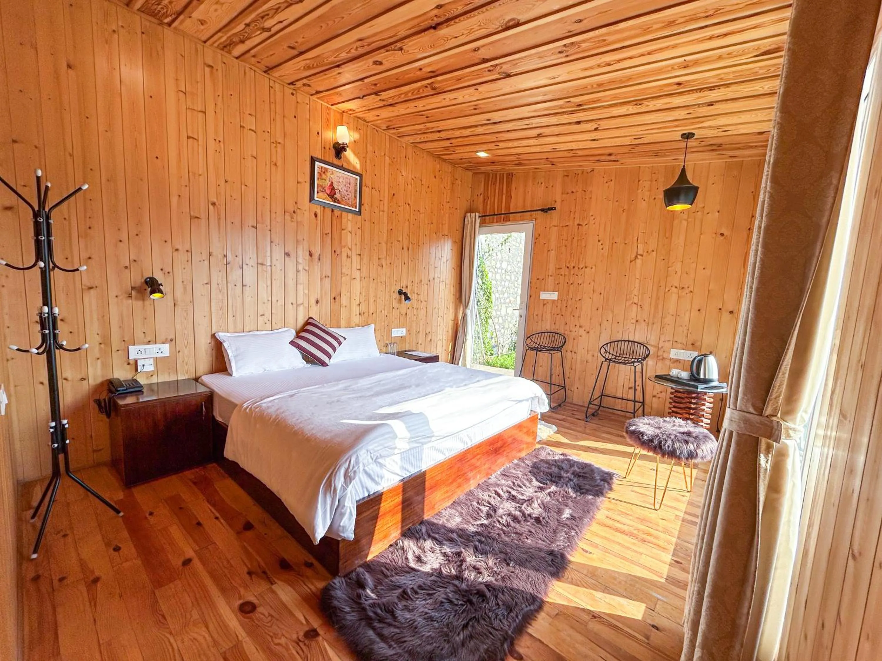 Photo of the whole room, Bed in THEHIMALAYANLIVING WHISTLING PINES