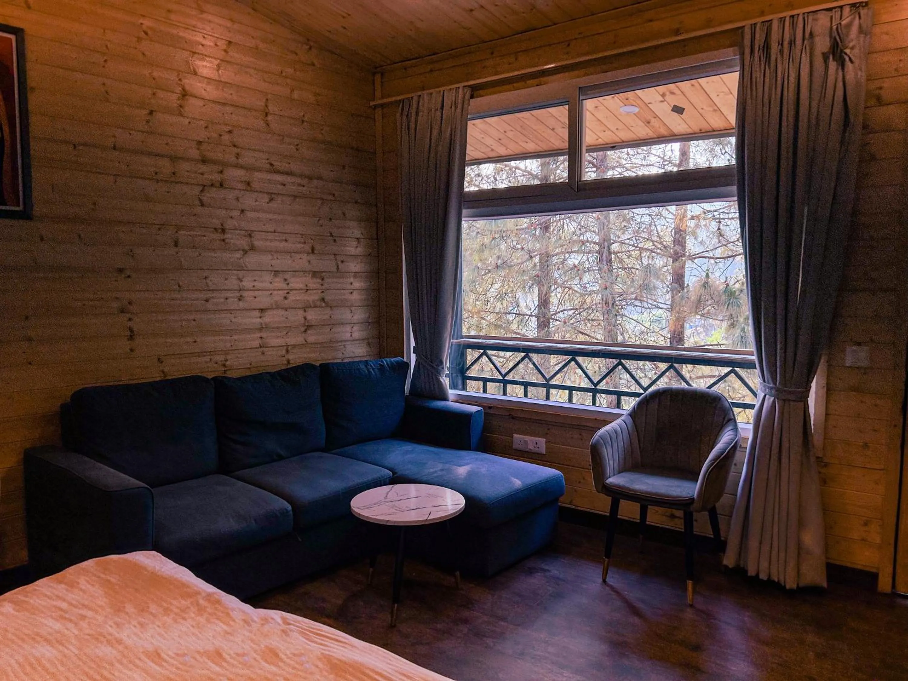 Seating area in THEHIMALAYANLIVING WHISTLING PINES