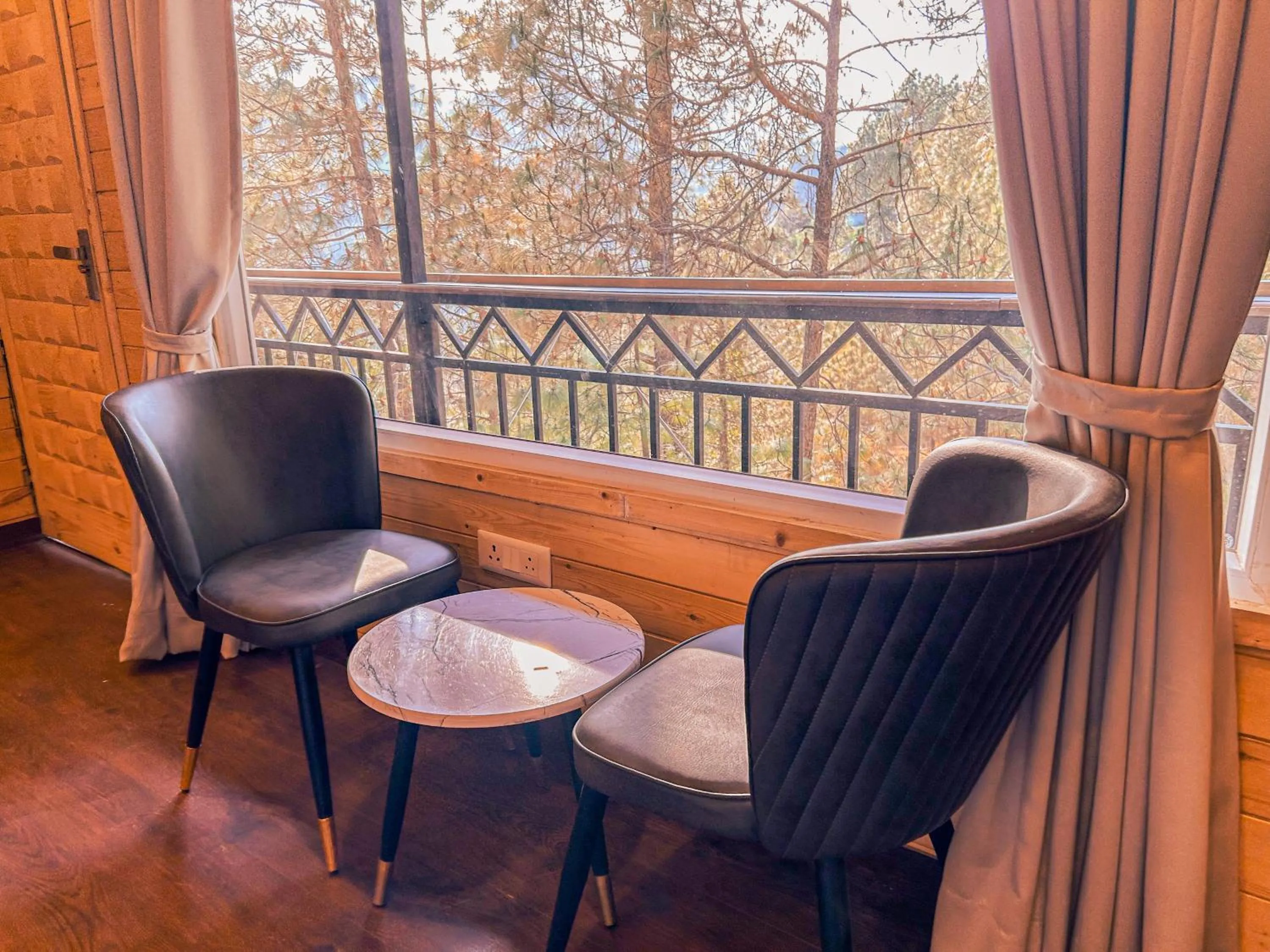 Seating area in THEHIMALAYANLIVING WHISTLING PINES