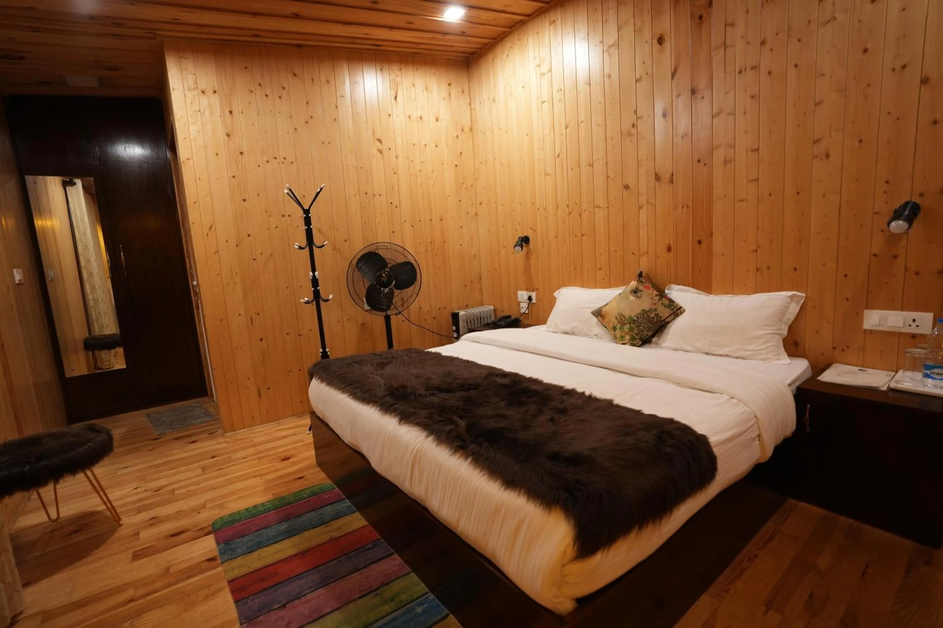 Photo of the whole room, Bed in THEHIMALAYANLIVING WHISTLING PINES