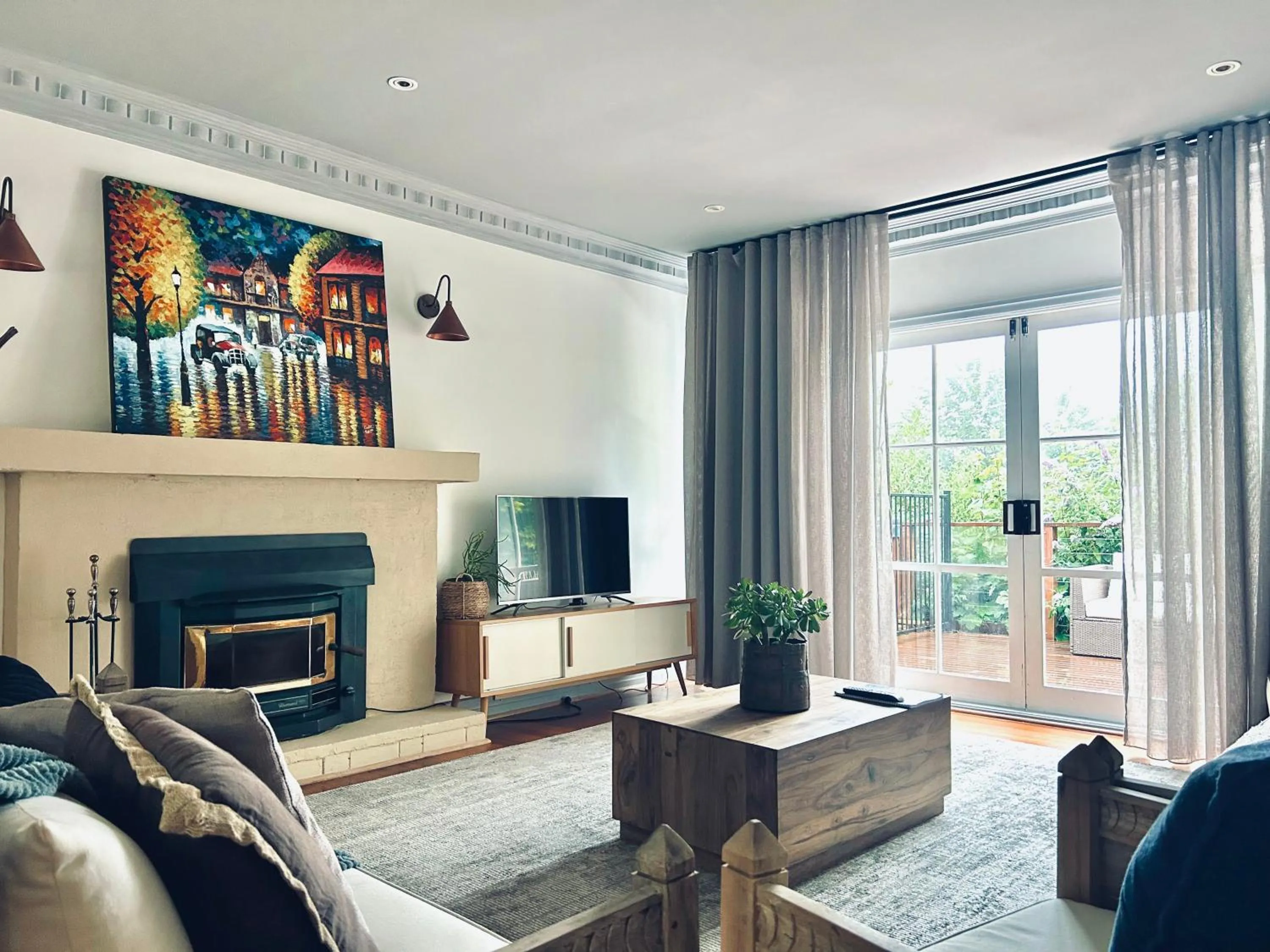 Seating area in Secluded Villa with Lush Gardens, Spa and Fireplace