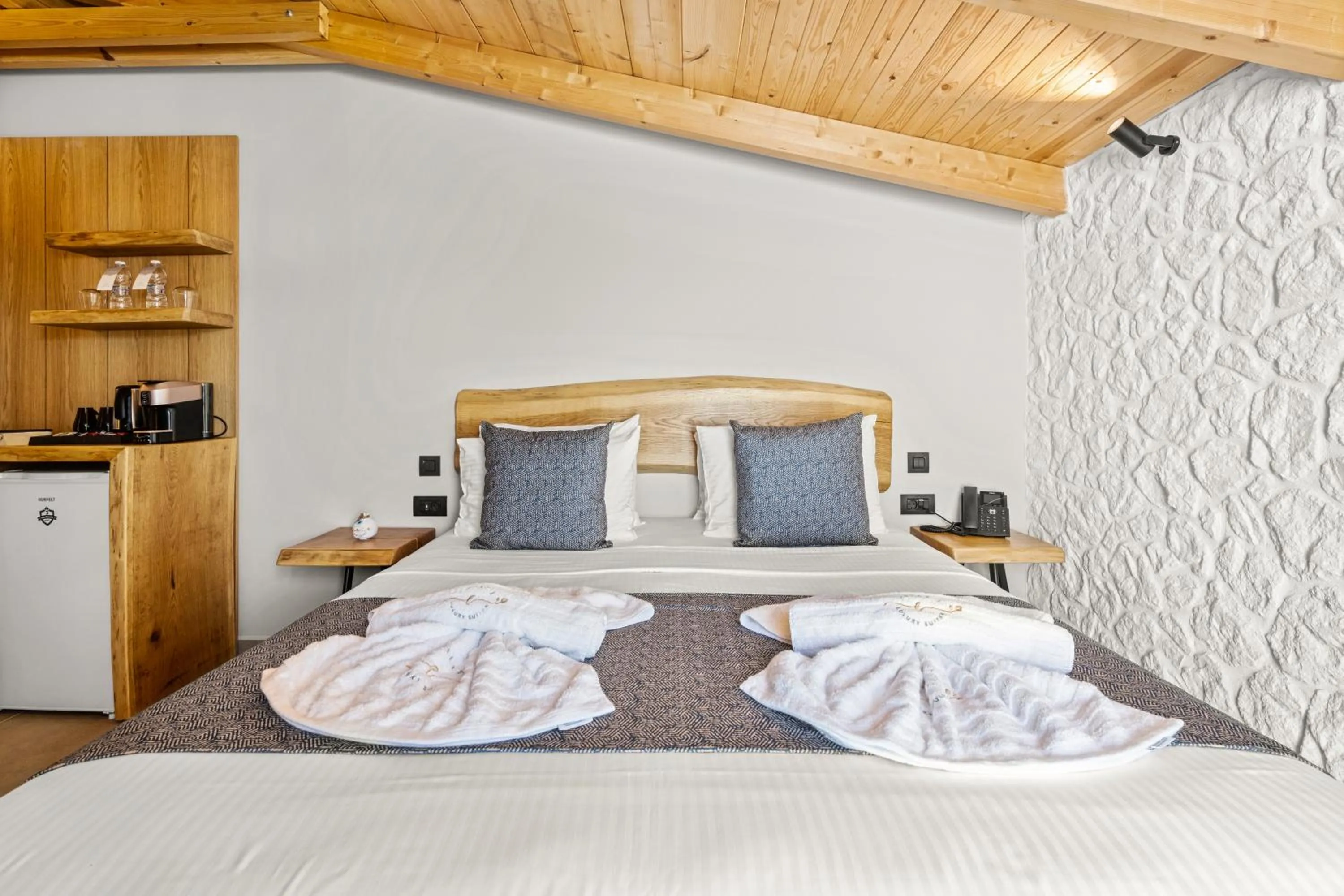 Bed in Emily's Luxury Suites