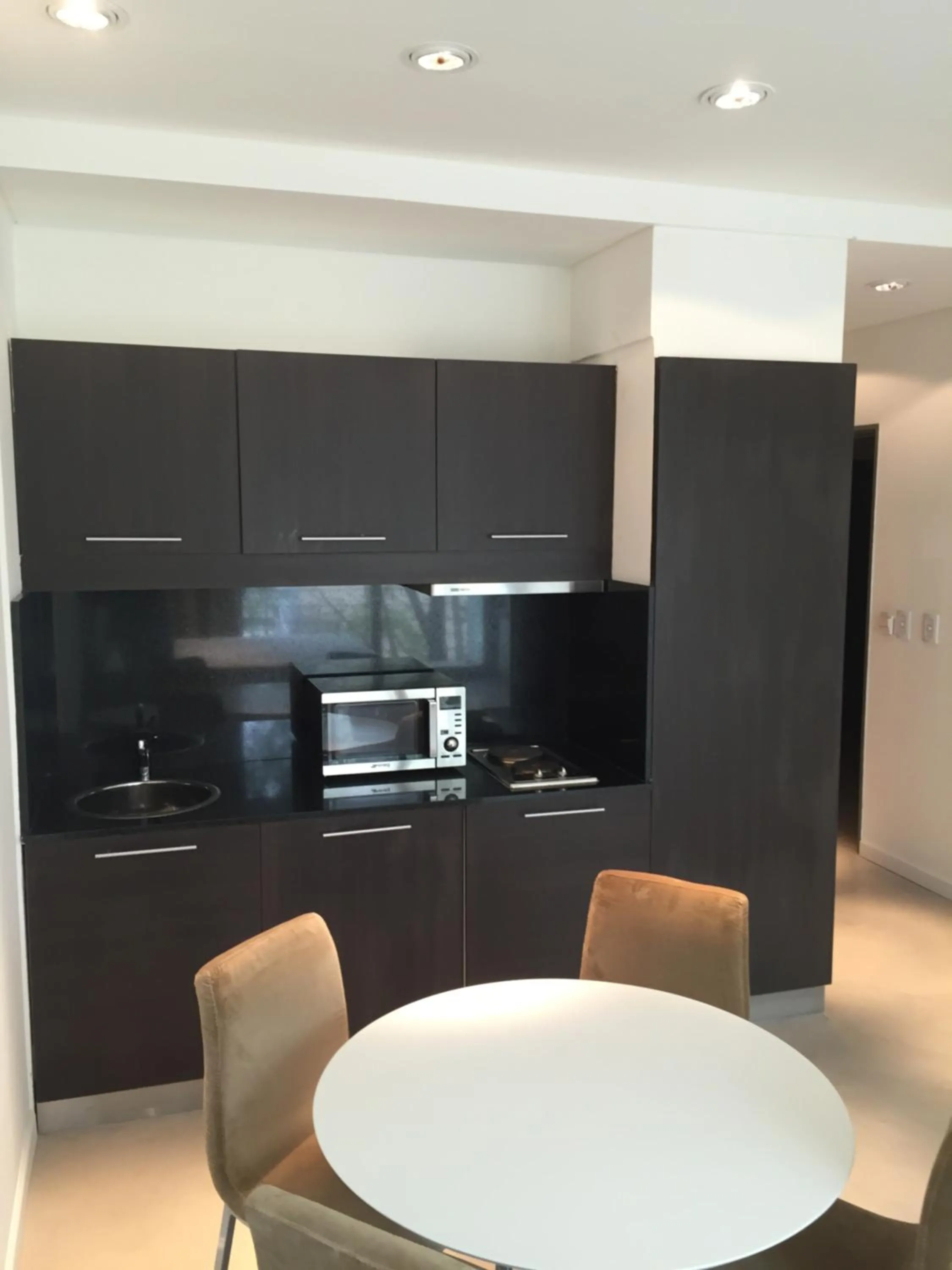 Kitchen or kitchenette in Bue Apartments