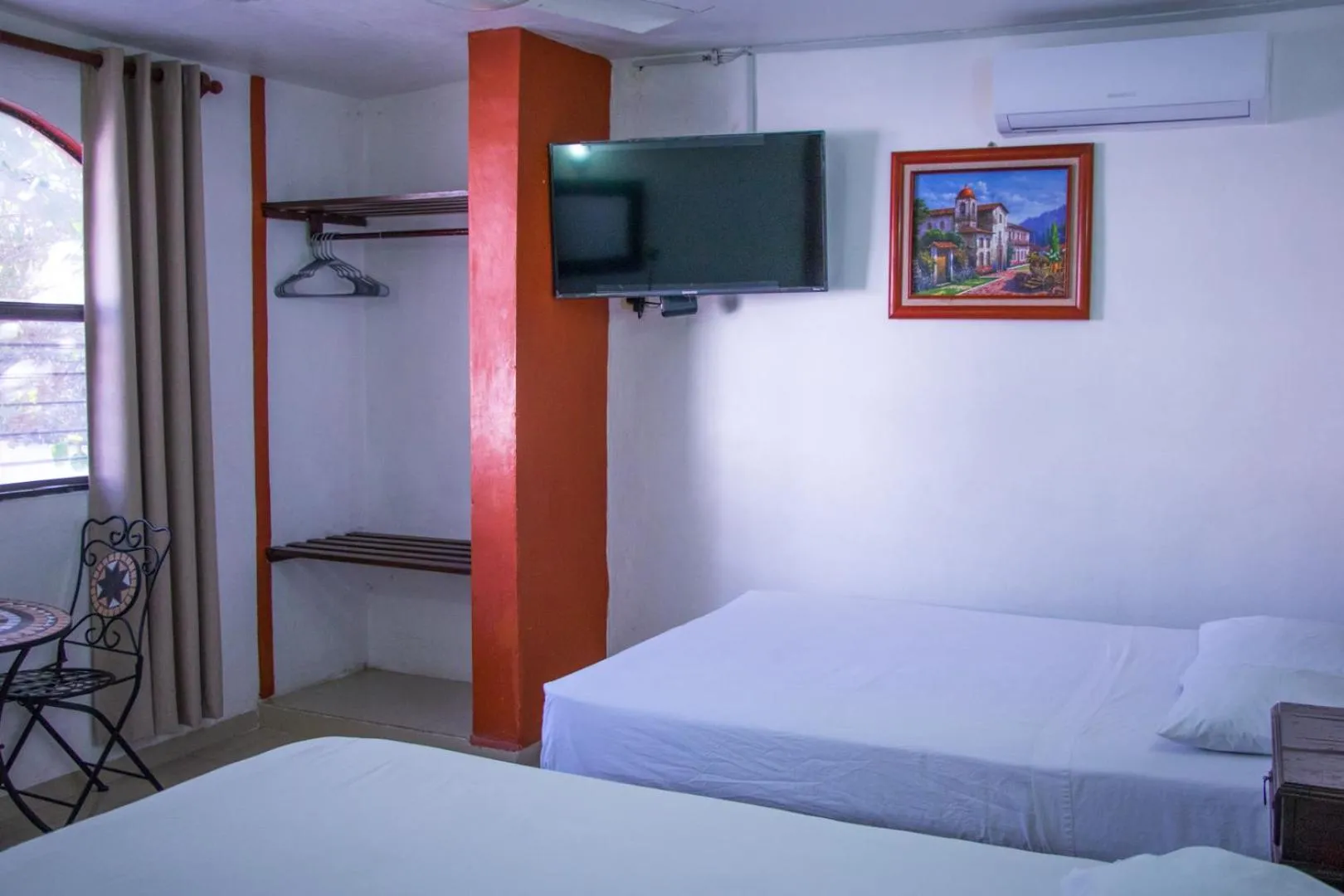 Bed in Hotel Posada del Angel