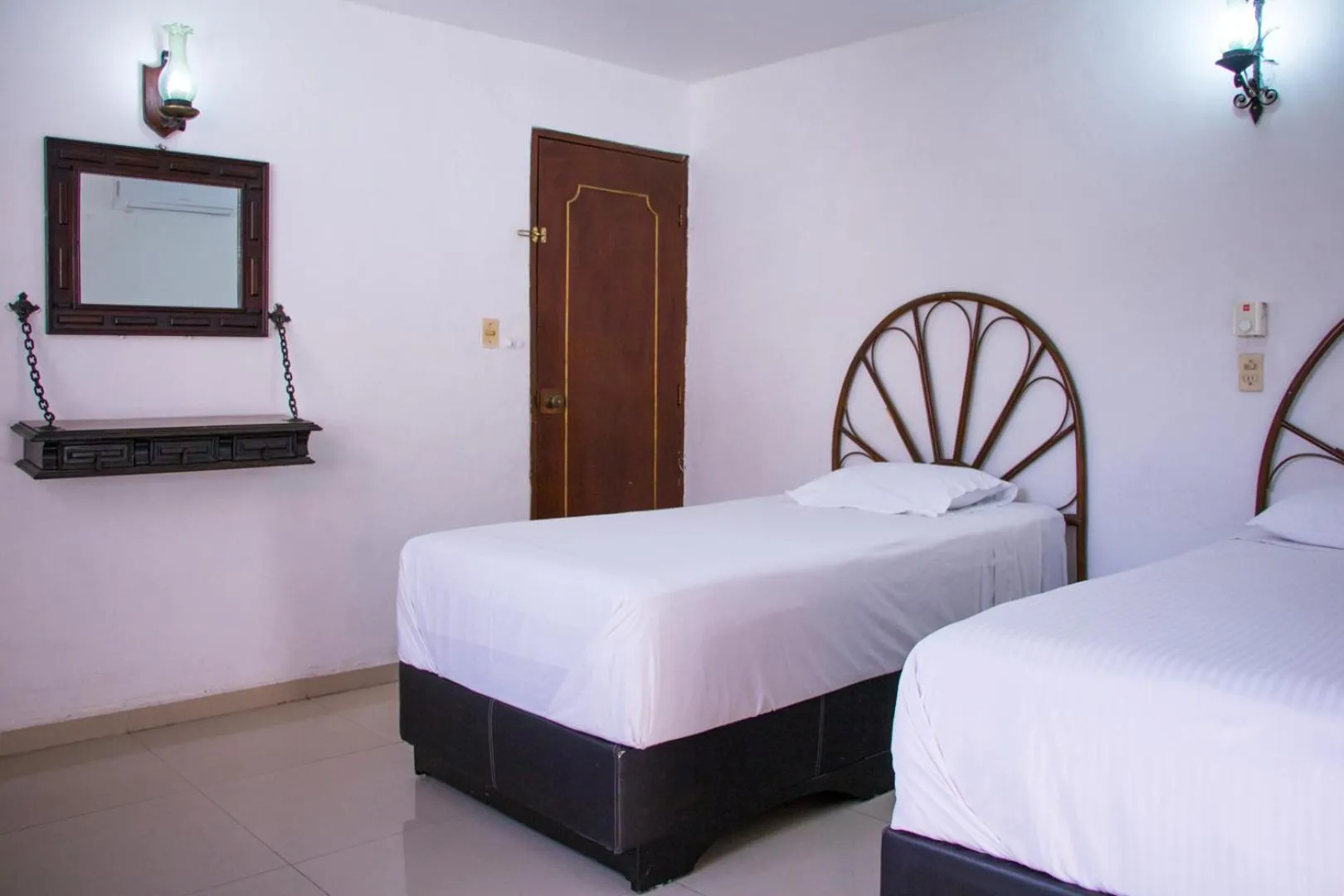 Bed in Hotel Posada del Angel