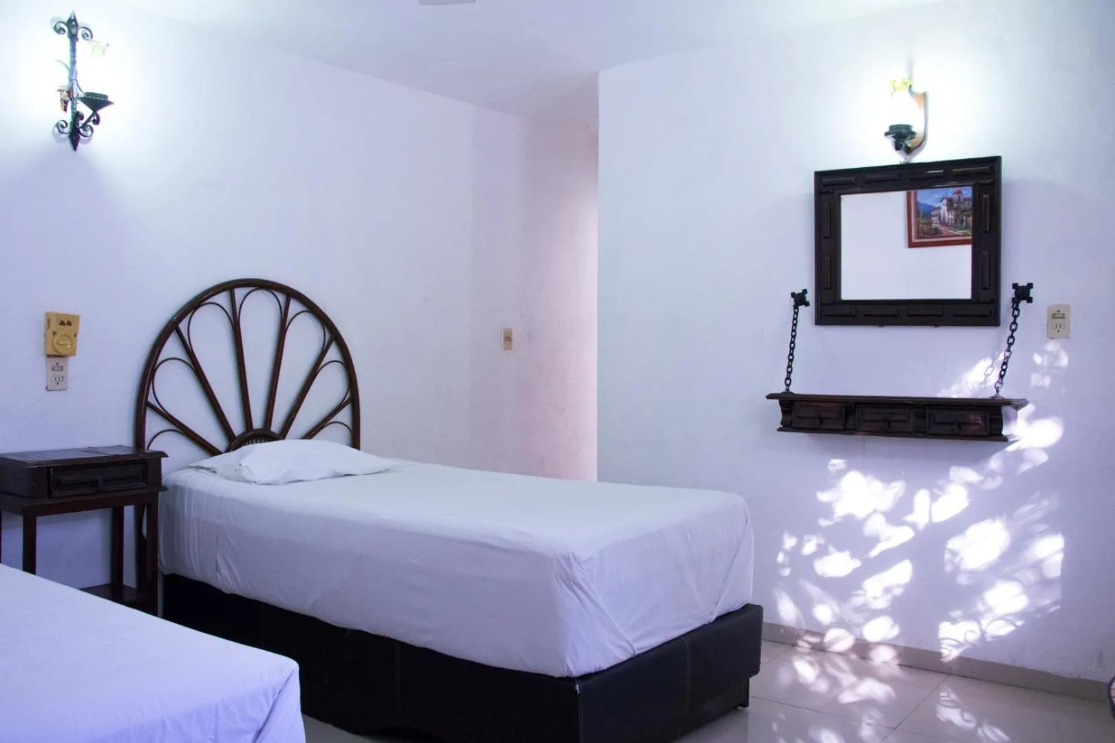 Bed in Hotel Posada del Angel
