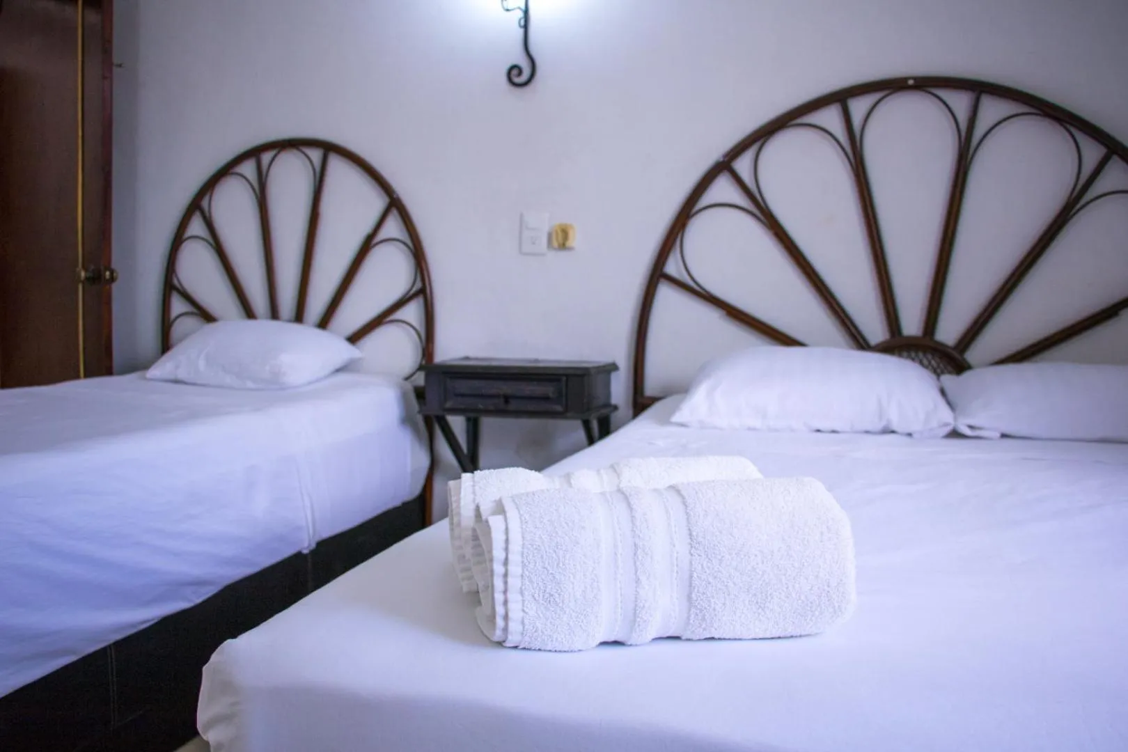 Bed in Hotel Posada del Angel