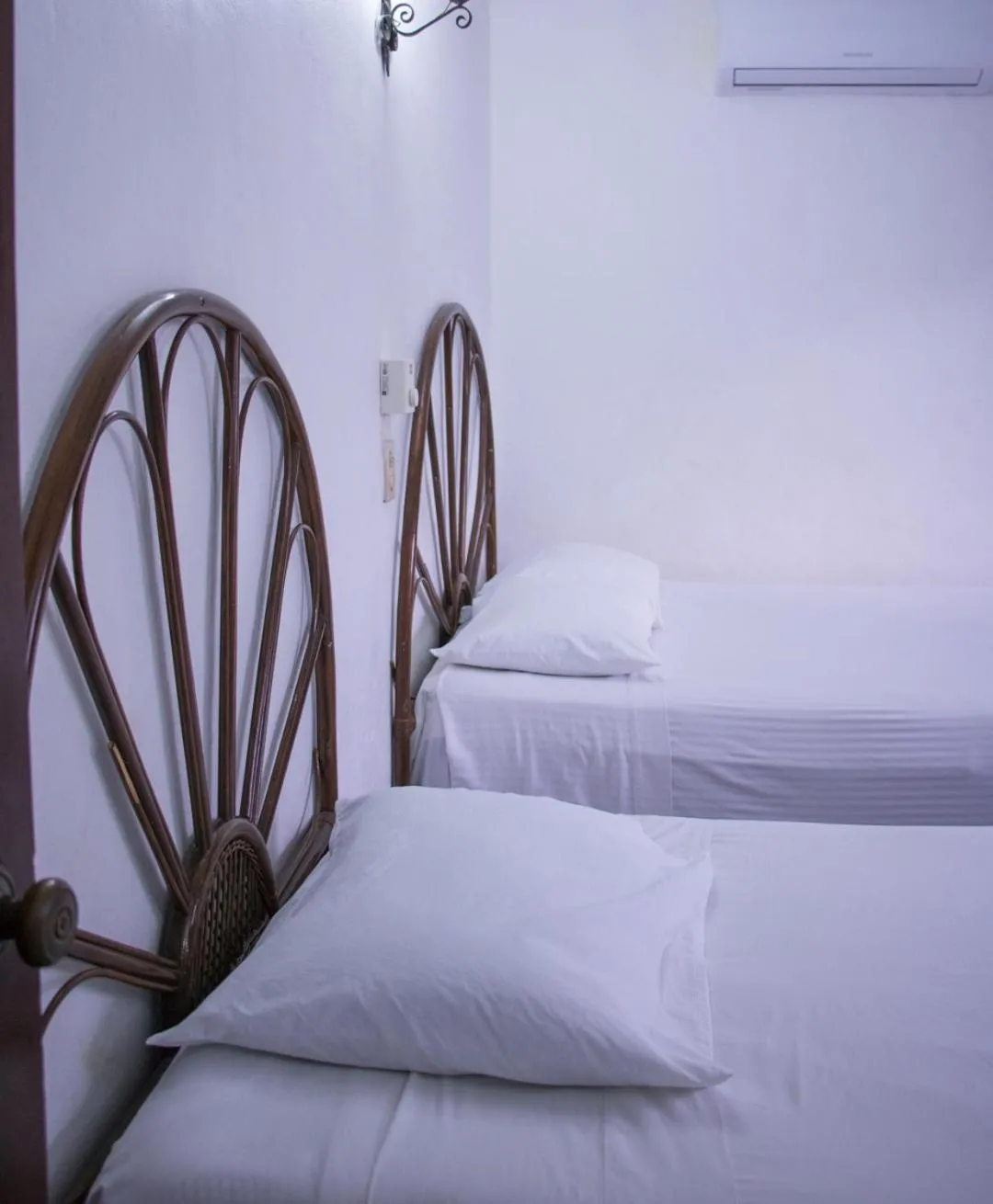 Bed in Hotel Posada del Angel