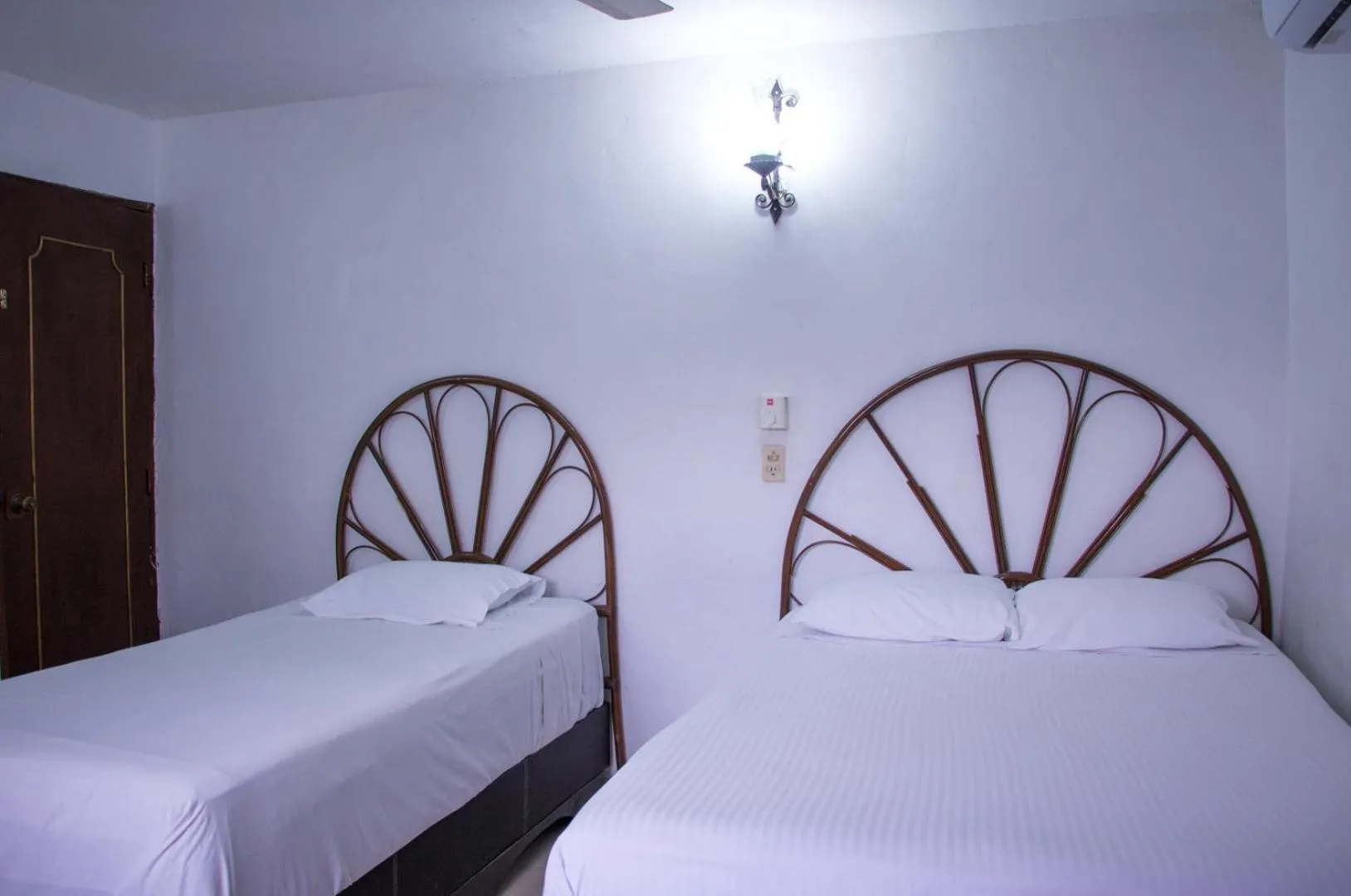 Bed in Hotel Posada del Angel