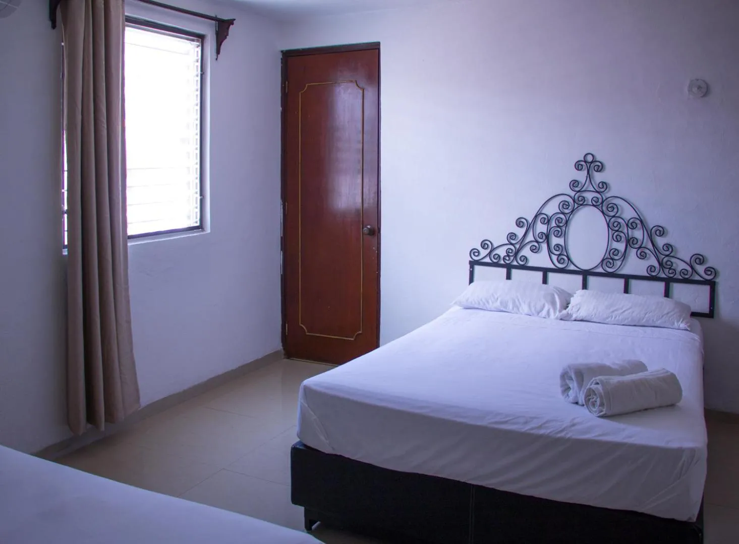 Bed in Hotel Posada del Angel
