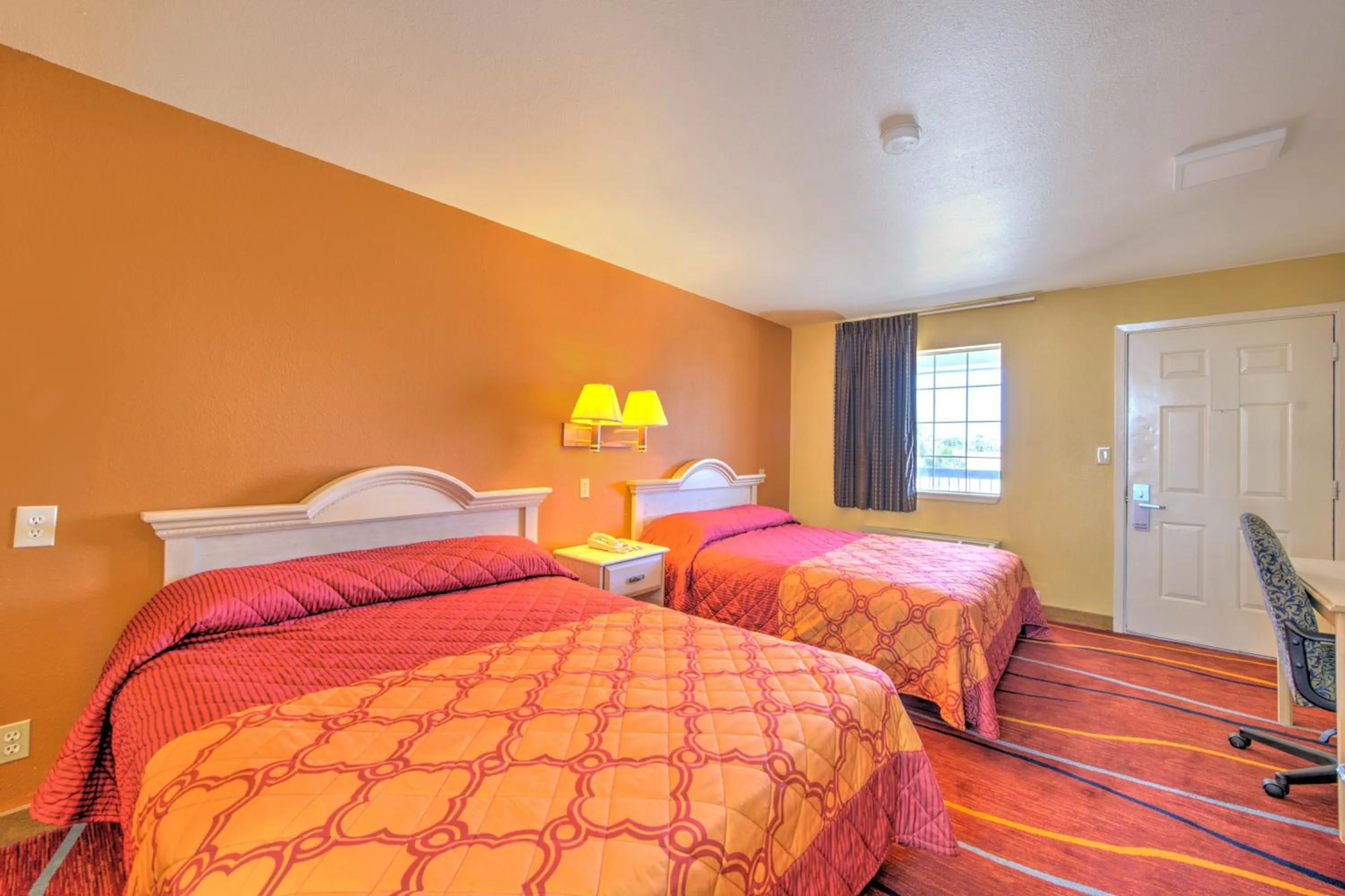 Bedroom, Bed in Heights Inn by Townhouse Harker Heights Killeen