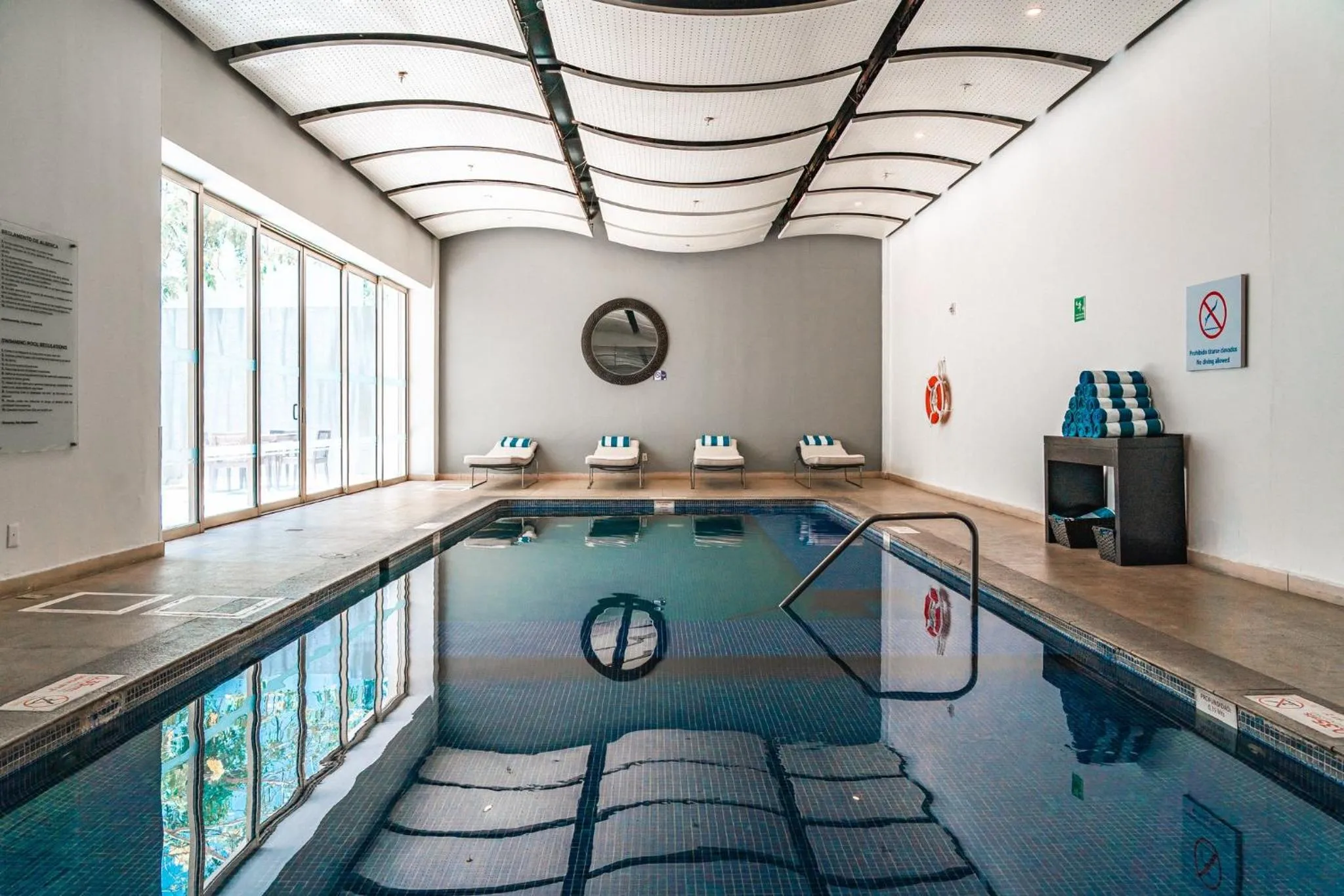 Swimming pool in Holiday Inn Guadalajara Patria-Universidad by IHG