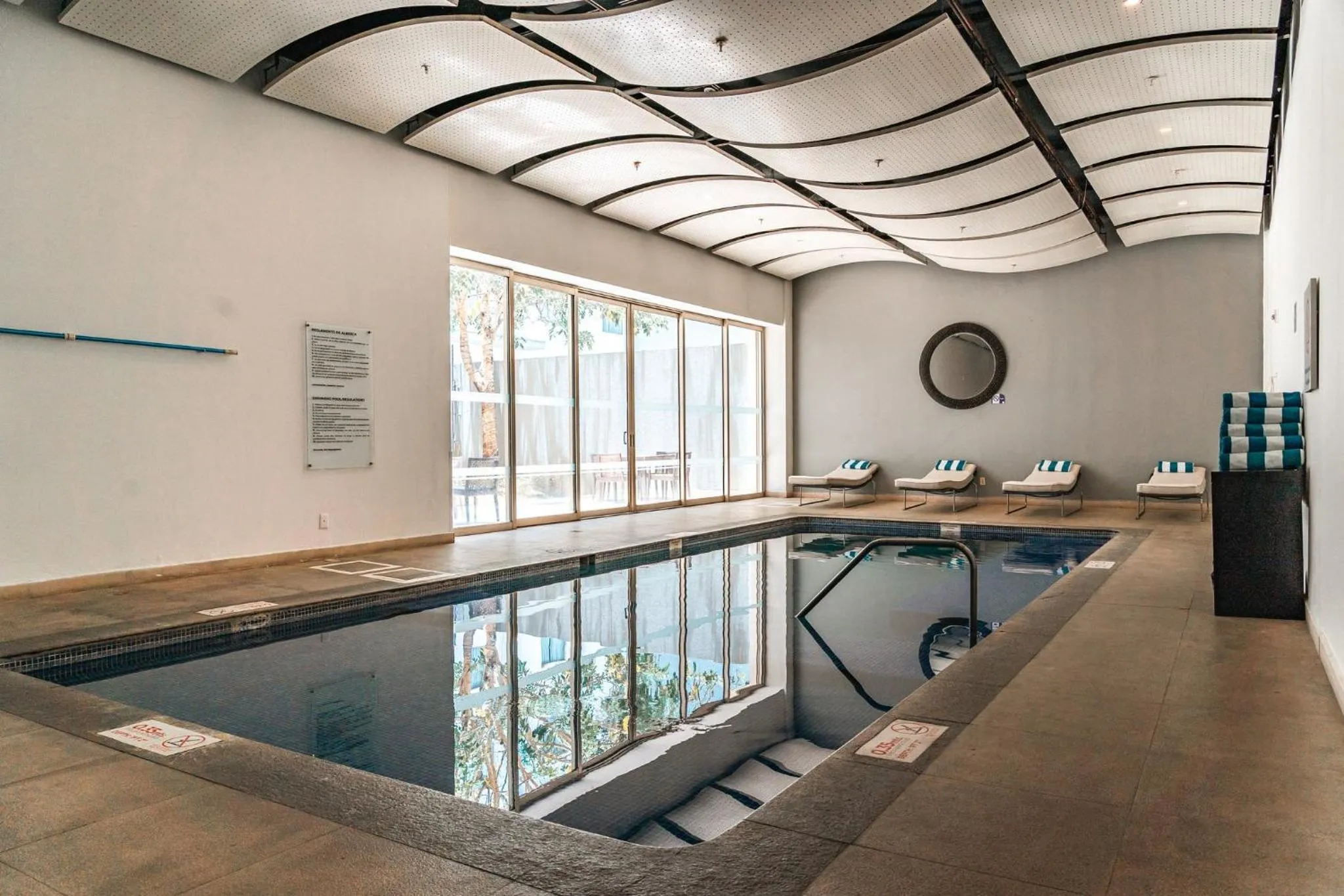 Swimming pool in Holiday Inn Guadalajara Patria-Universidad by IHG