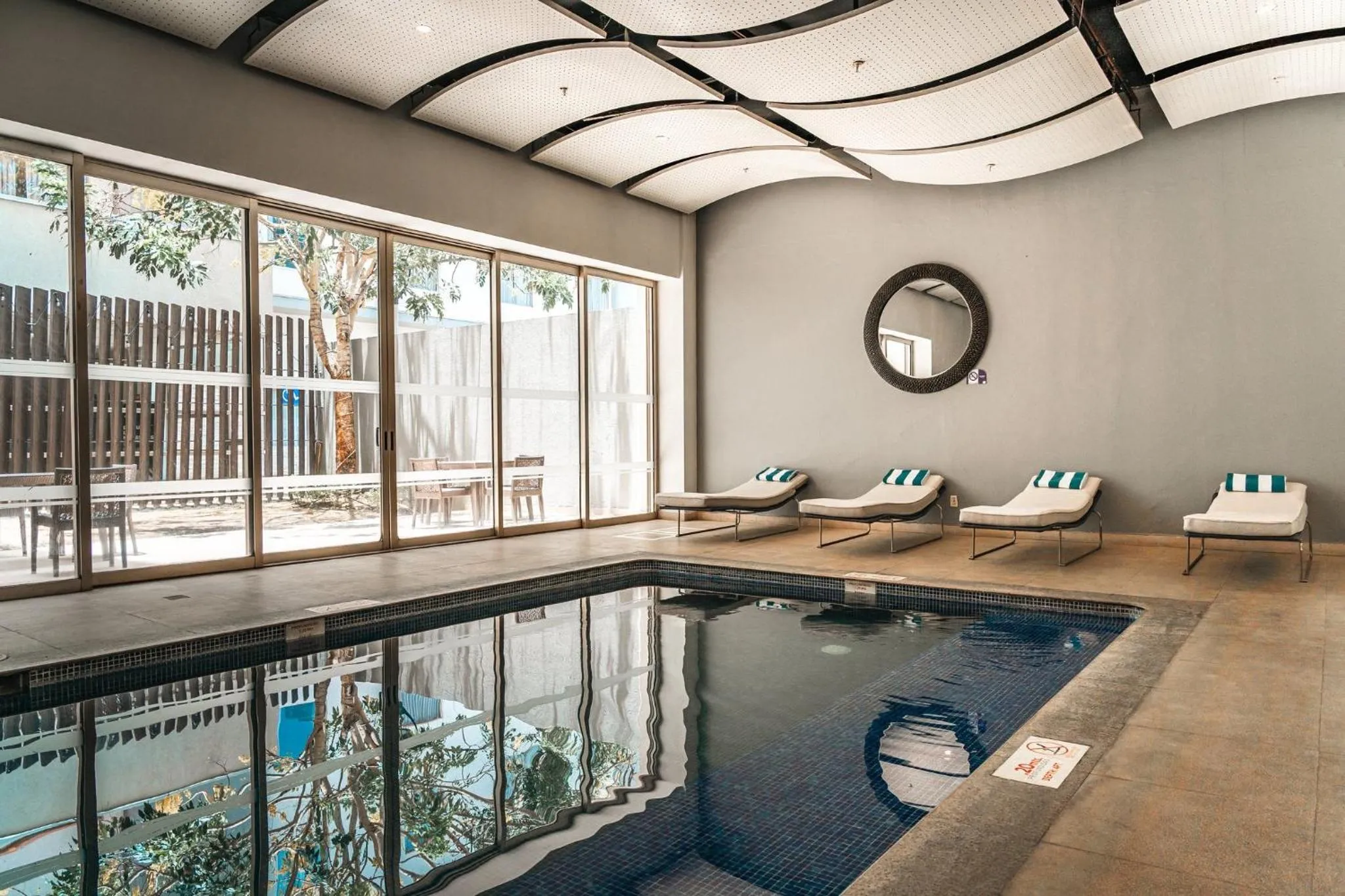 Swimming pool in Holiday Inn Guadalajara Patria-Universidad by IHG