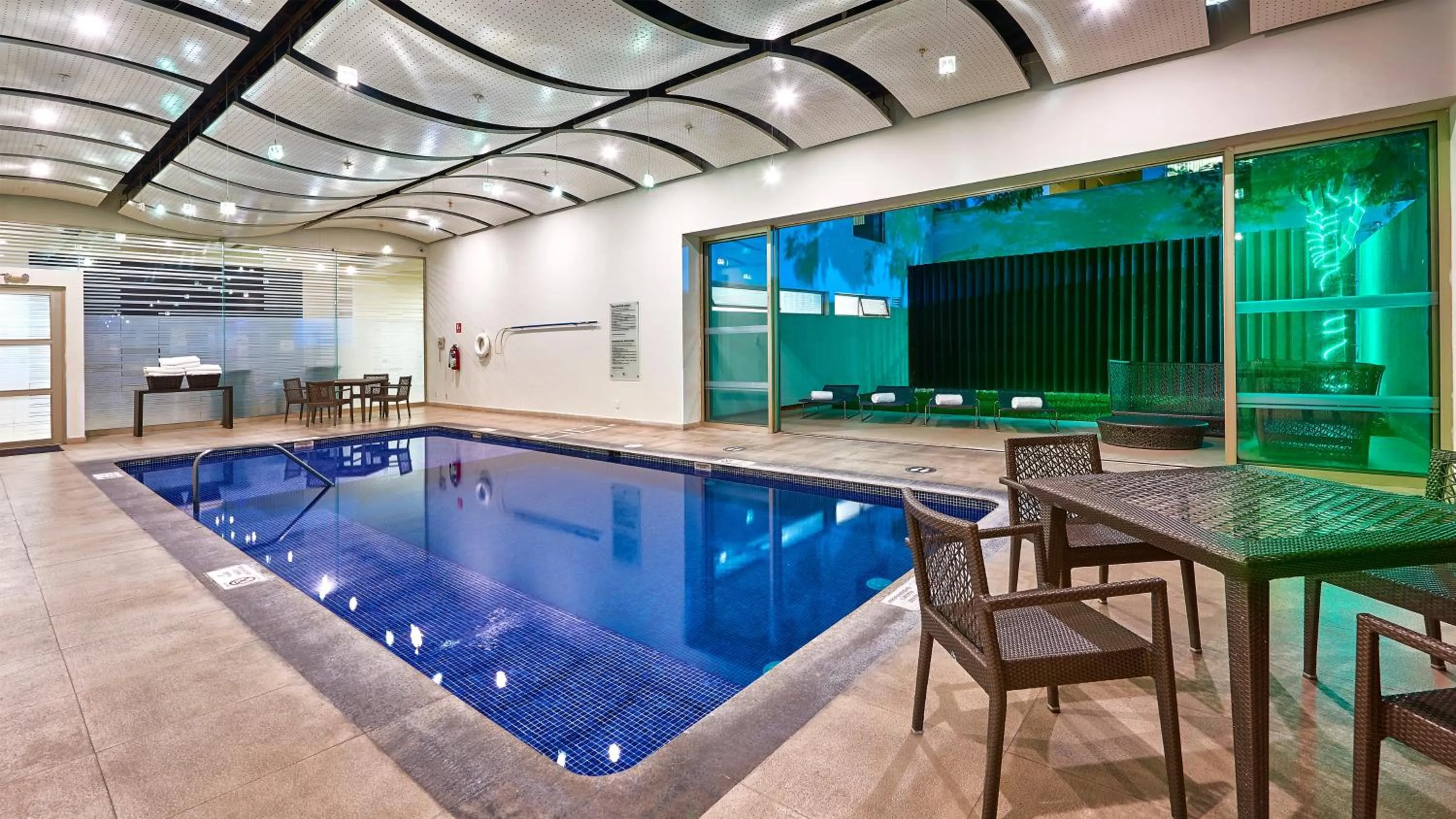 Swimming pool in Holiday Inn Guadalajara Patria-Universidad by IHG