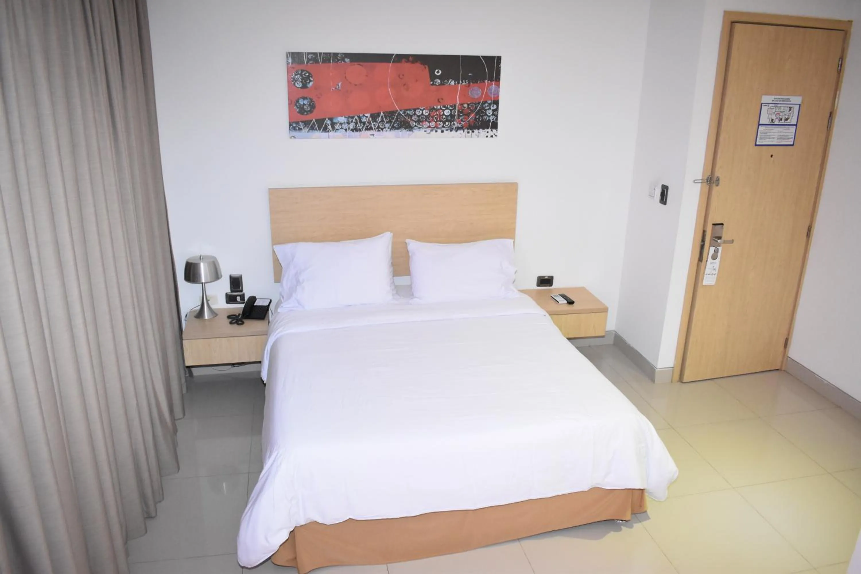 Photo of the whole room, Bed in Radisson Diamond Barranquilla