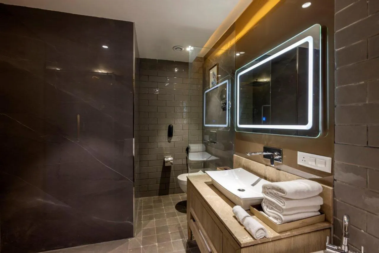 Shower in Sarovar Portico Morbi