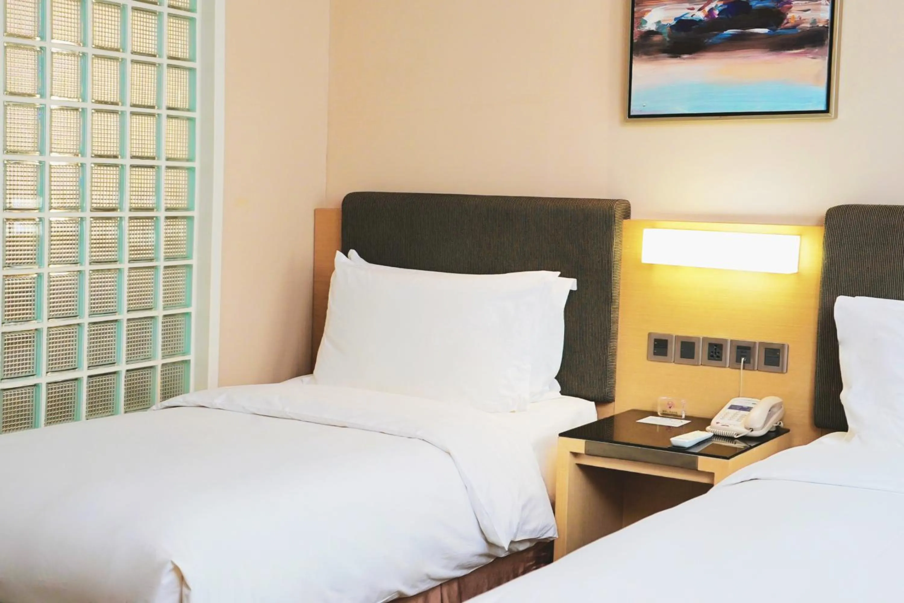 Bedroom, Bed in Holiday Inn Express Shenyang Golden Corridor by IHG