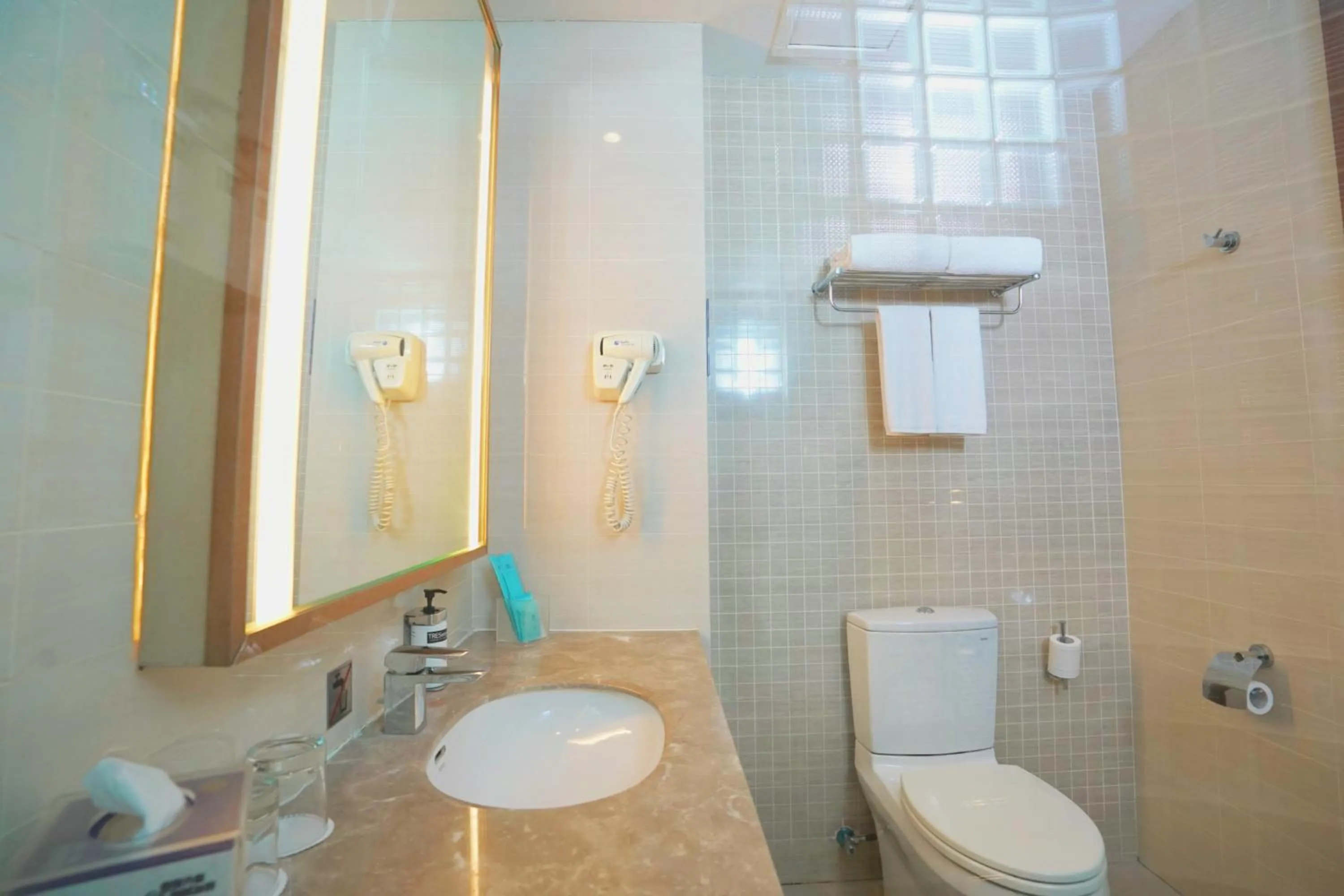 Bathroom in Holiday Inn Express Shenyang Golden Corridor by IHG