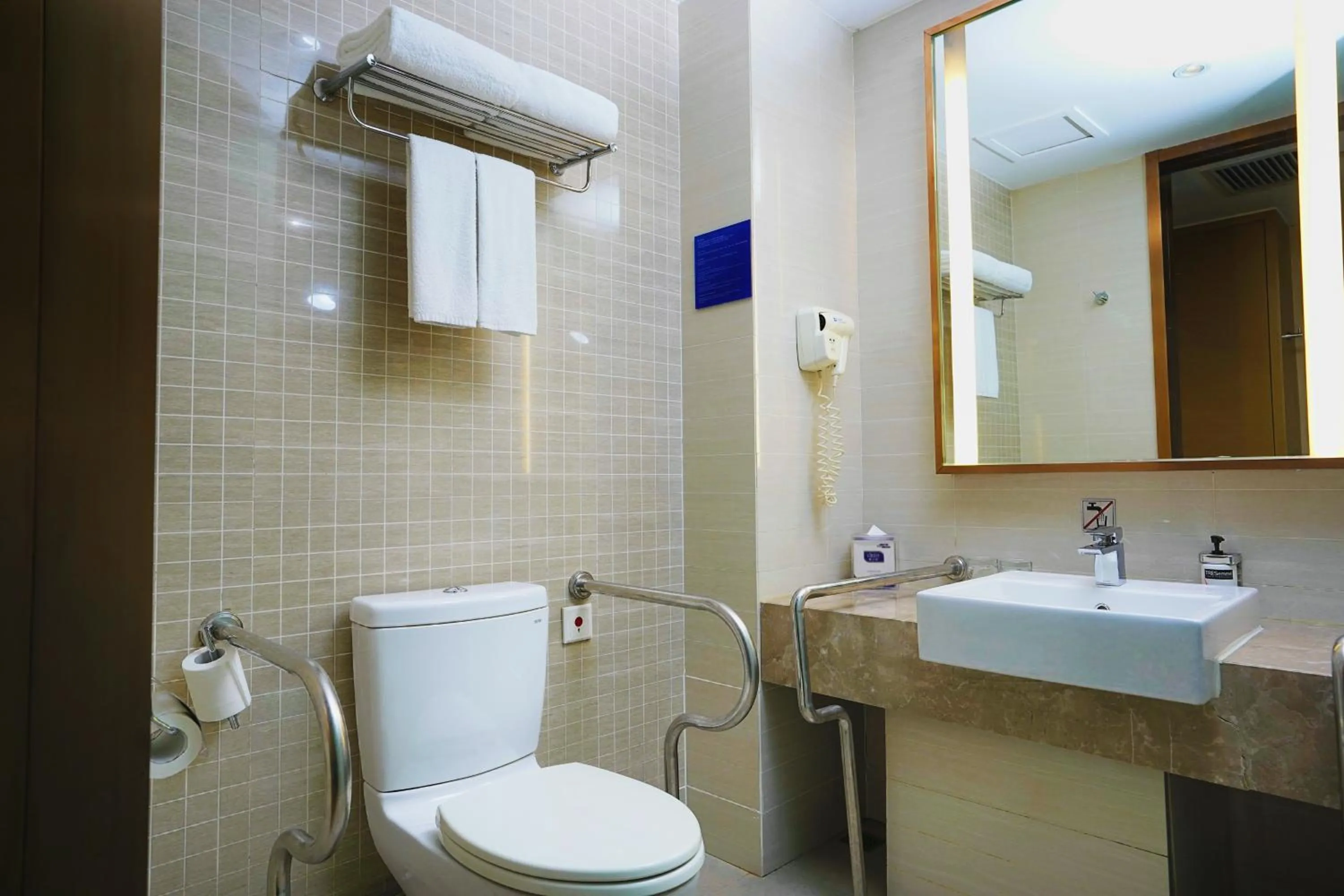 Toilet in Holiday Inn Express Shenyang Golden Corridor by IHG