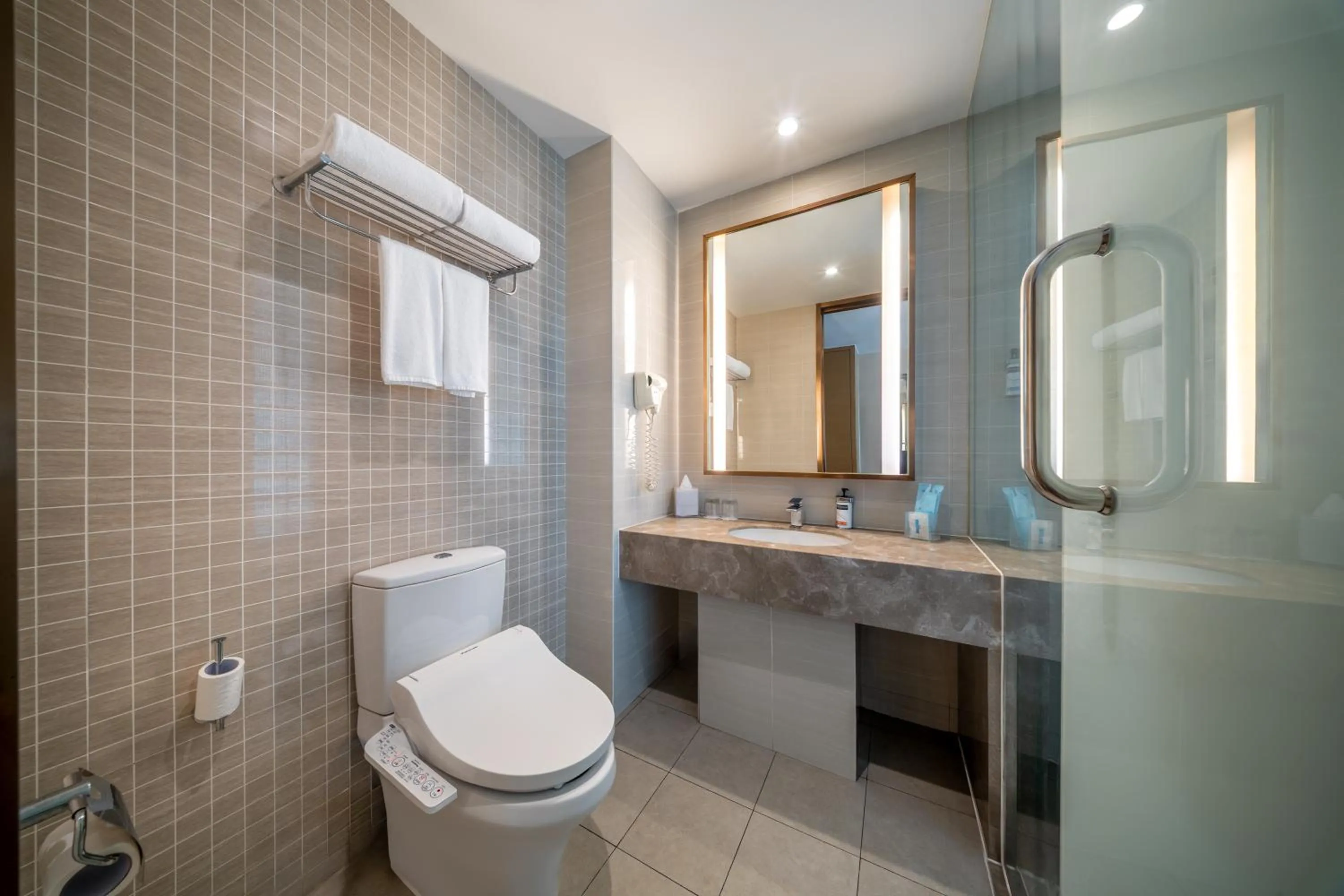 Toilet in Holiday Inn Express Shenyang Golden Corridor by IHG