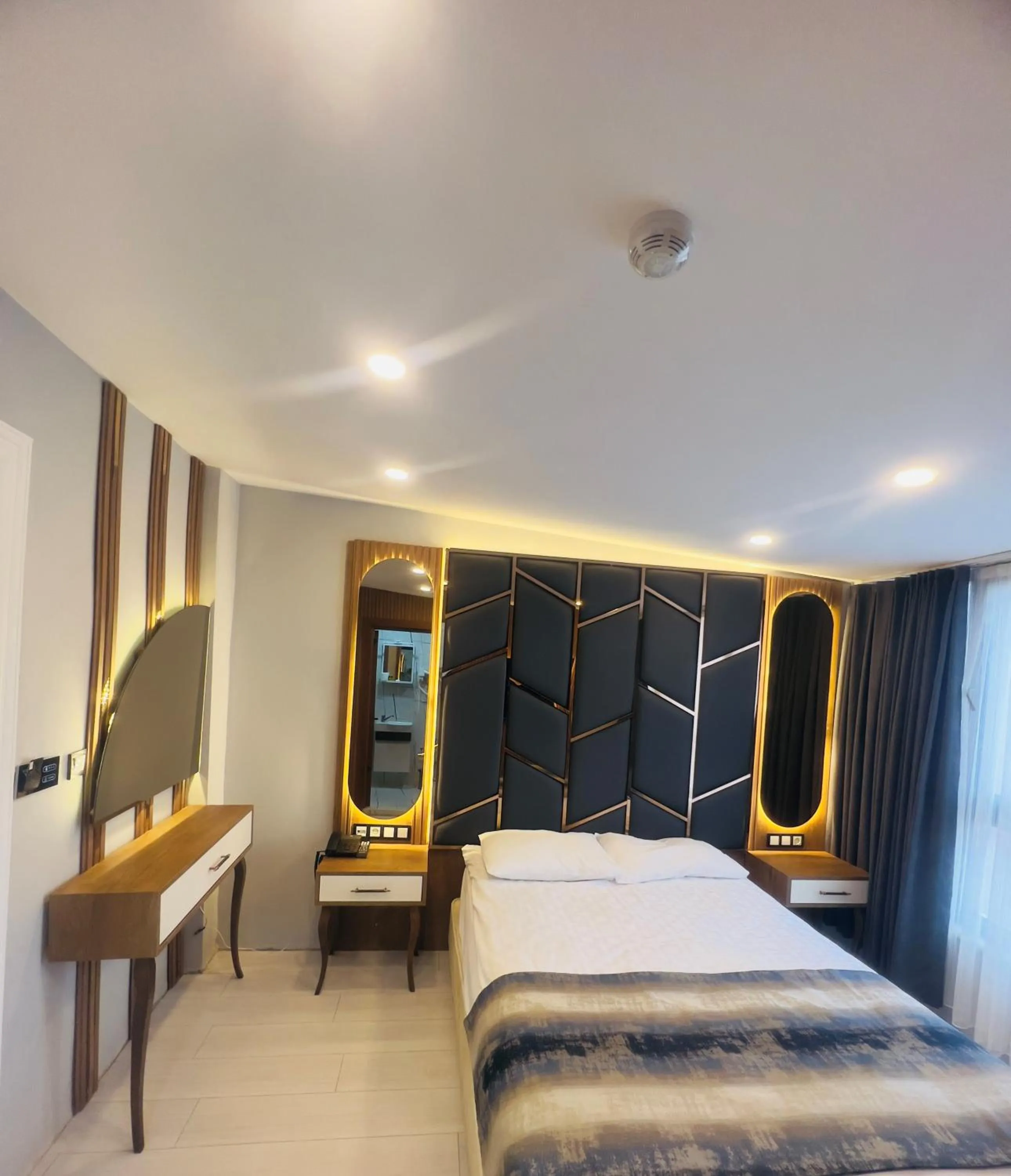 Bed in Crowned Hotel